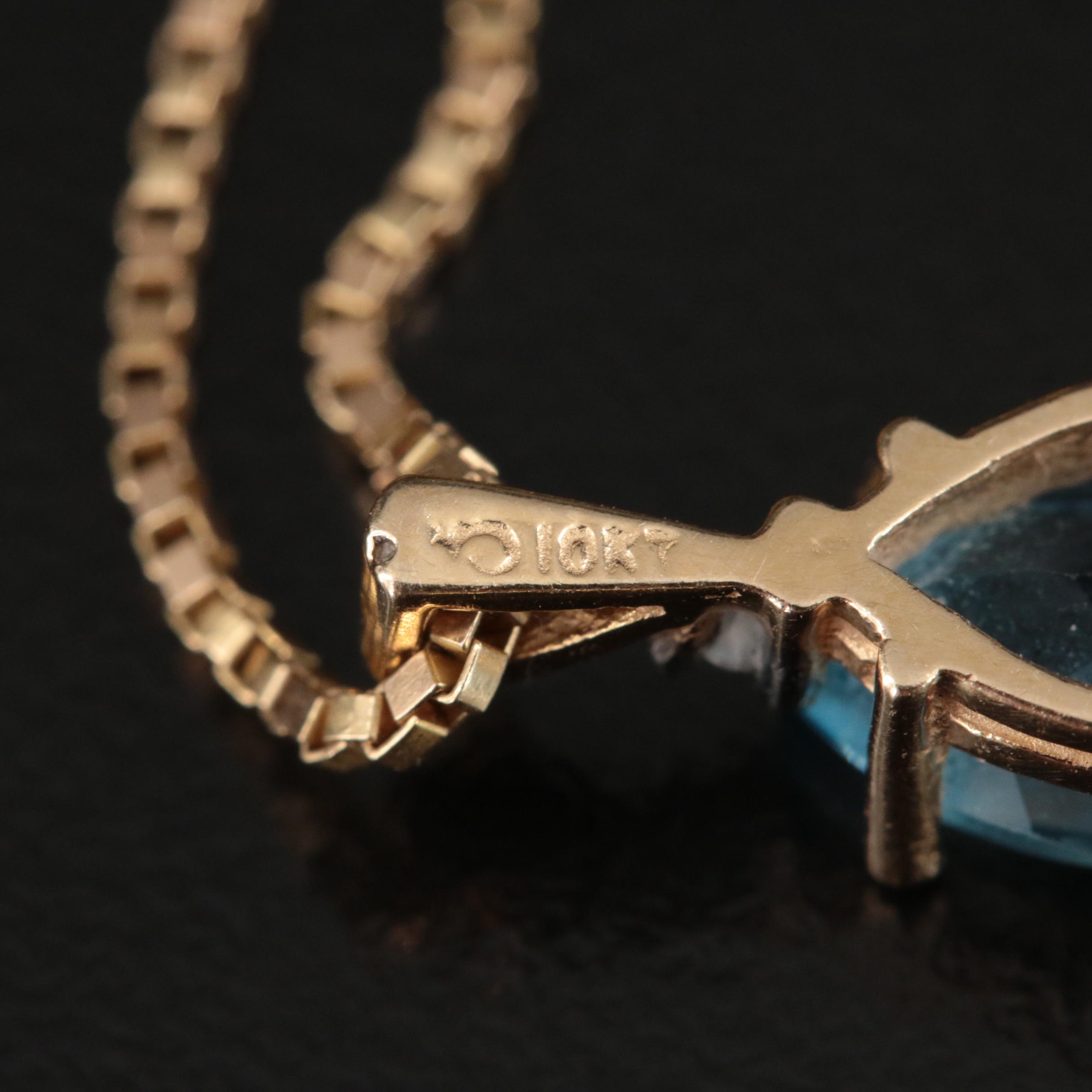 10K Sky Blue Topaz and Diamond Pendant on 14K Chain Necklace