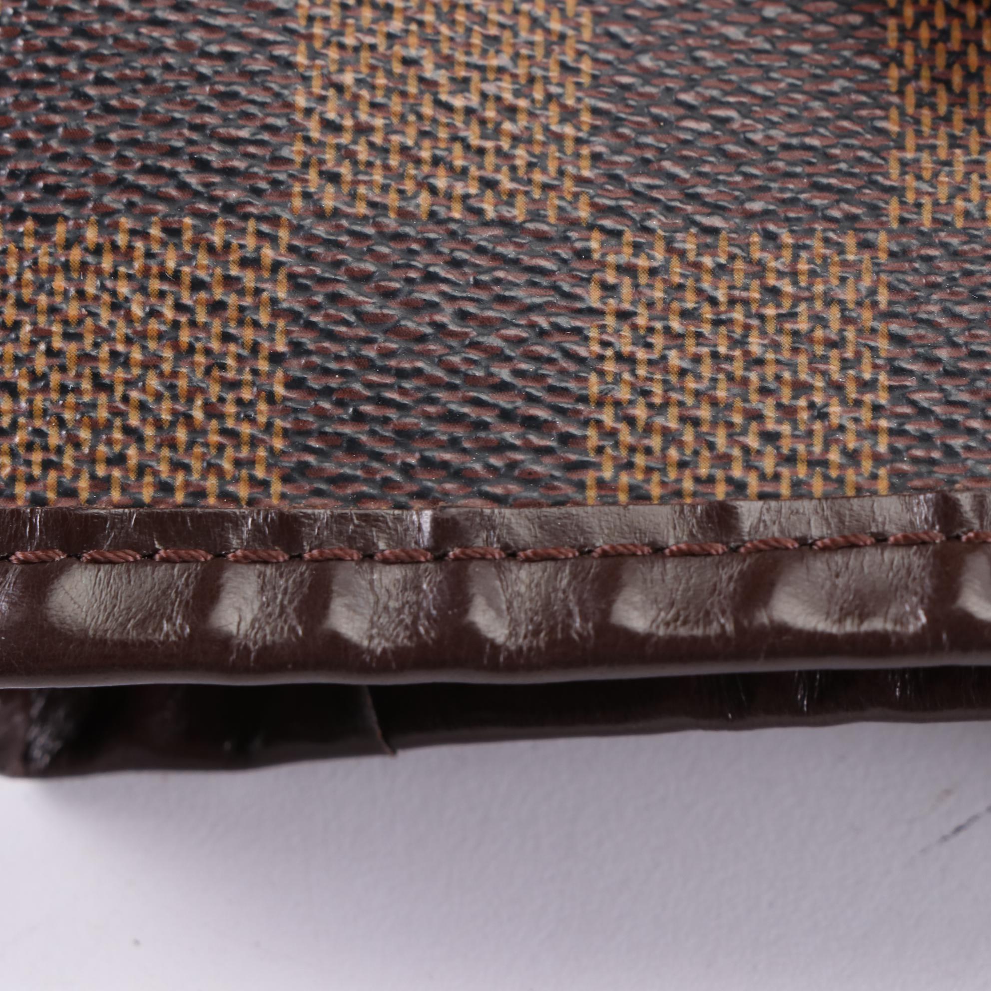 Louis Vuitton Neverfull MM in Damier Ebene Canvas and Leather