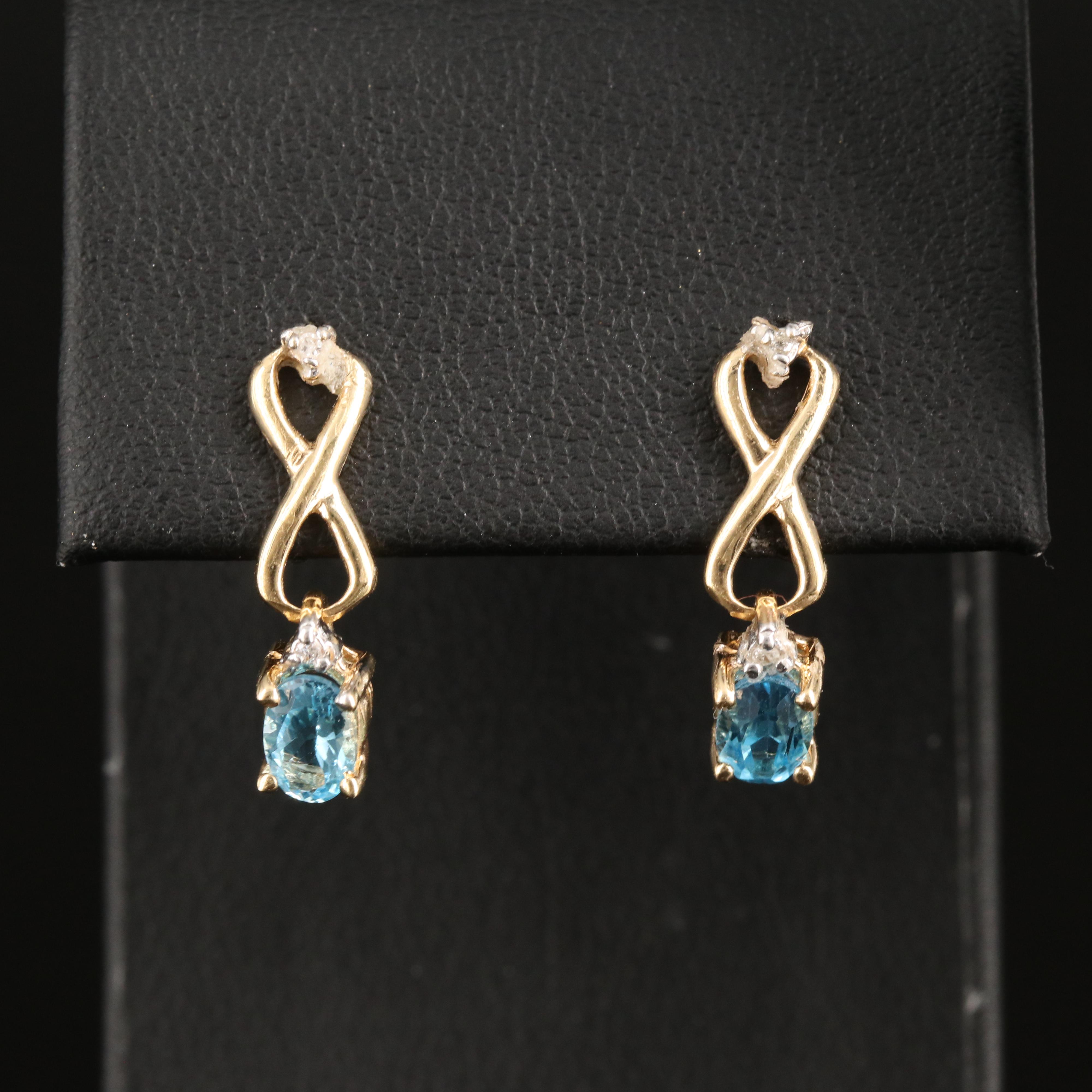 14K Sky Blue Topaz and Diamond Infinity Earrings