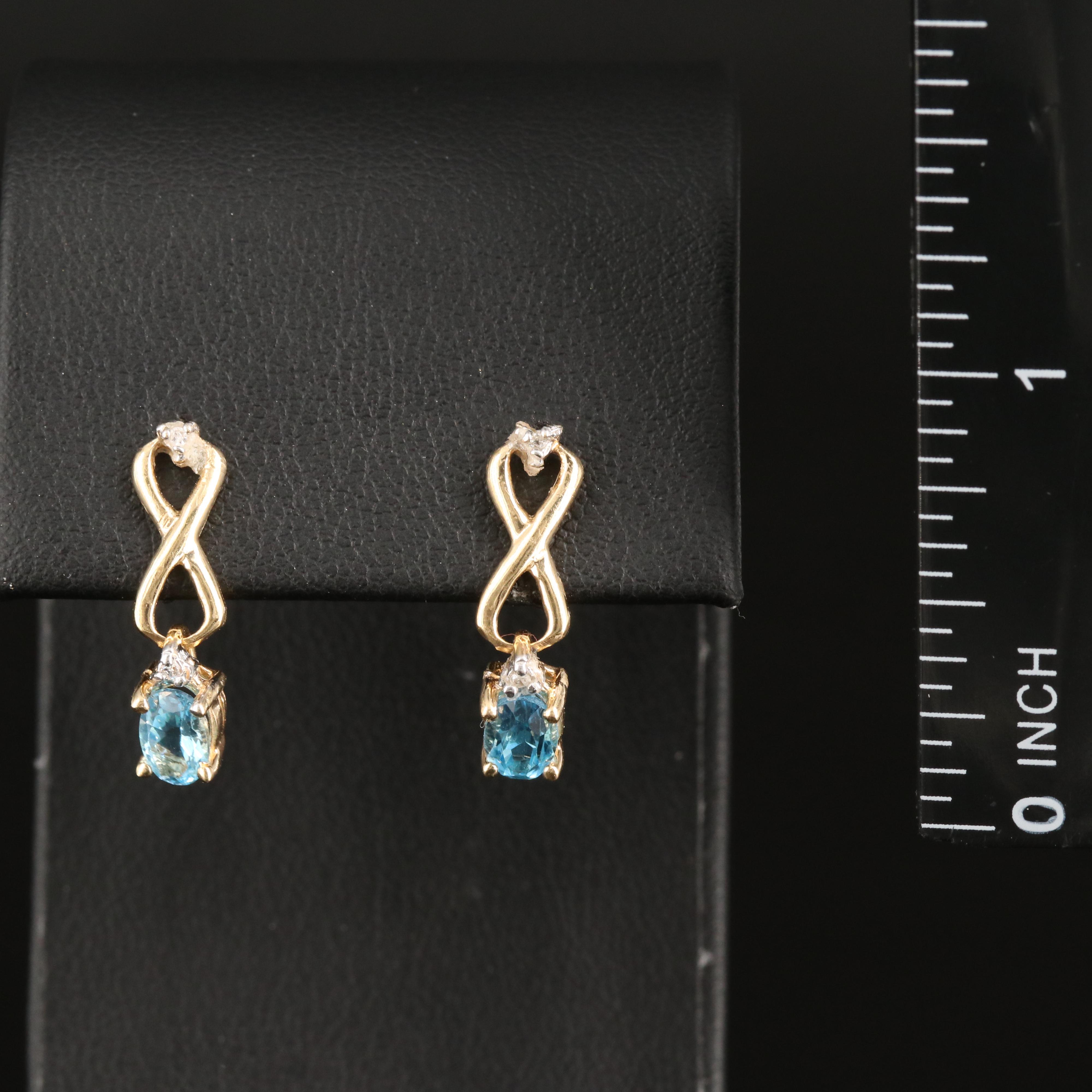 14K Sky Blue Topaz and Diamond Infinity Earrings