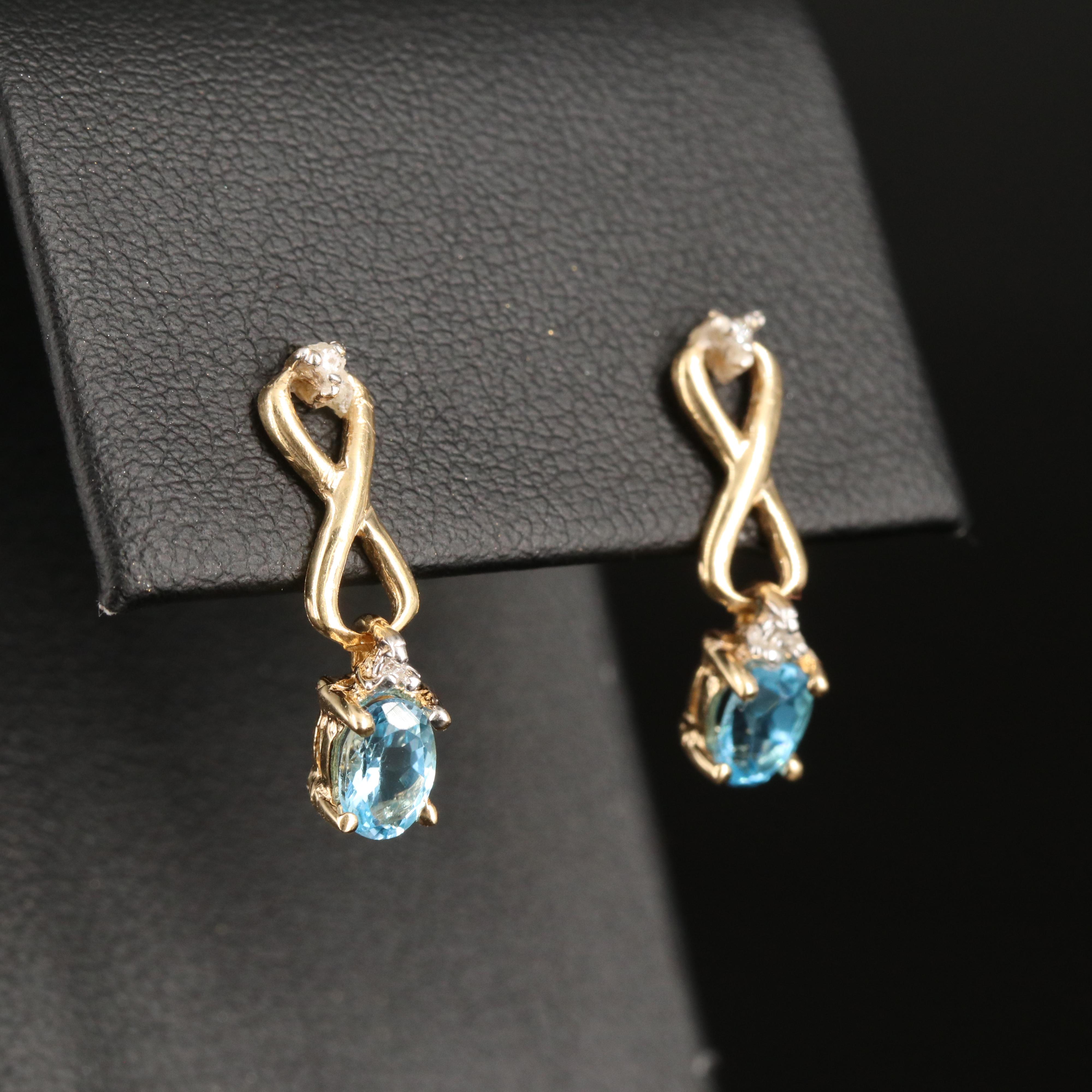 14K Sky Blue Topaz and Diamond Infinity Earrings