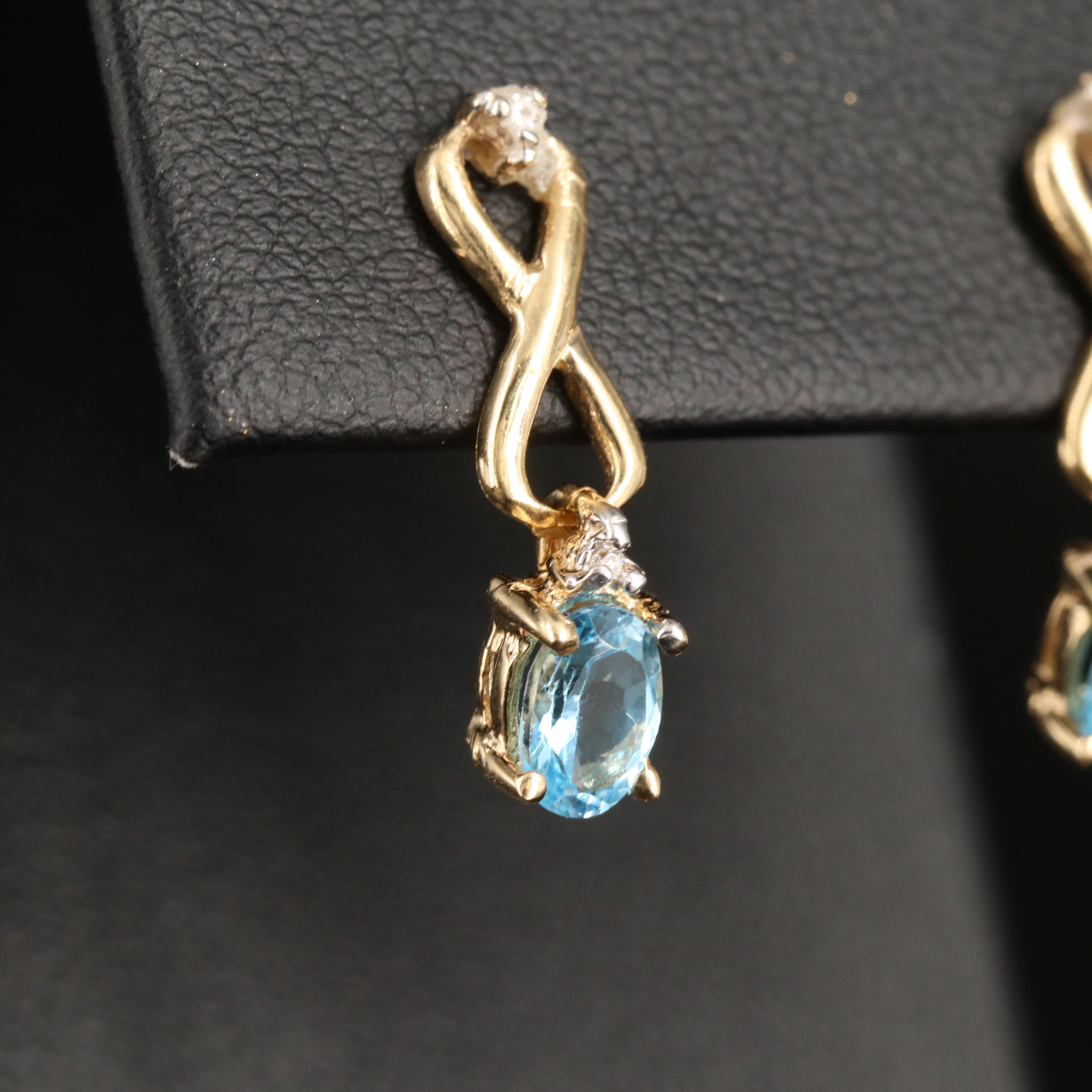 14K Sky Blue Topaz and Diamond Infinity Earrings