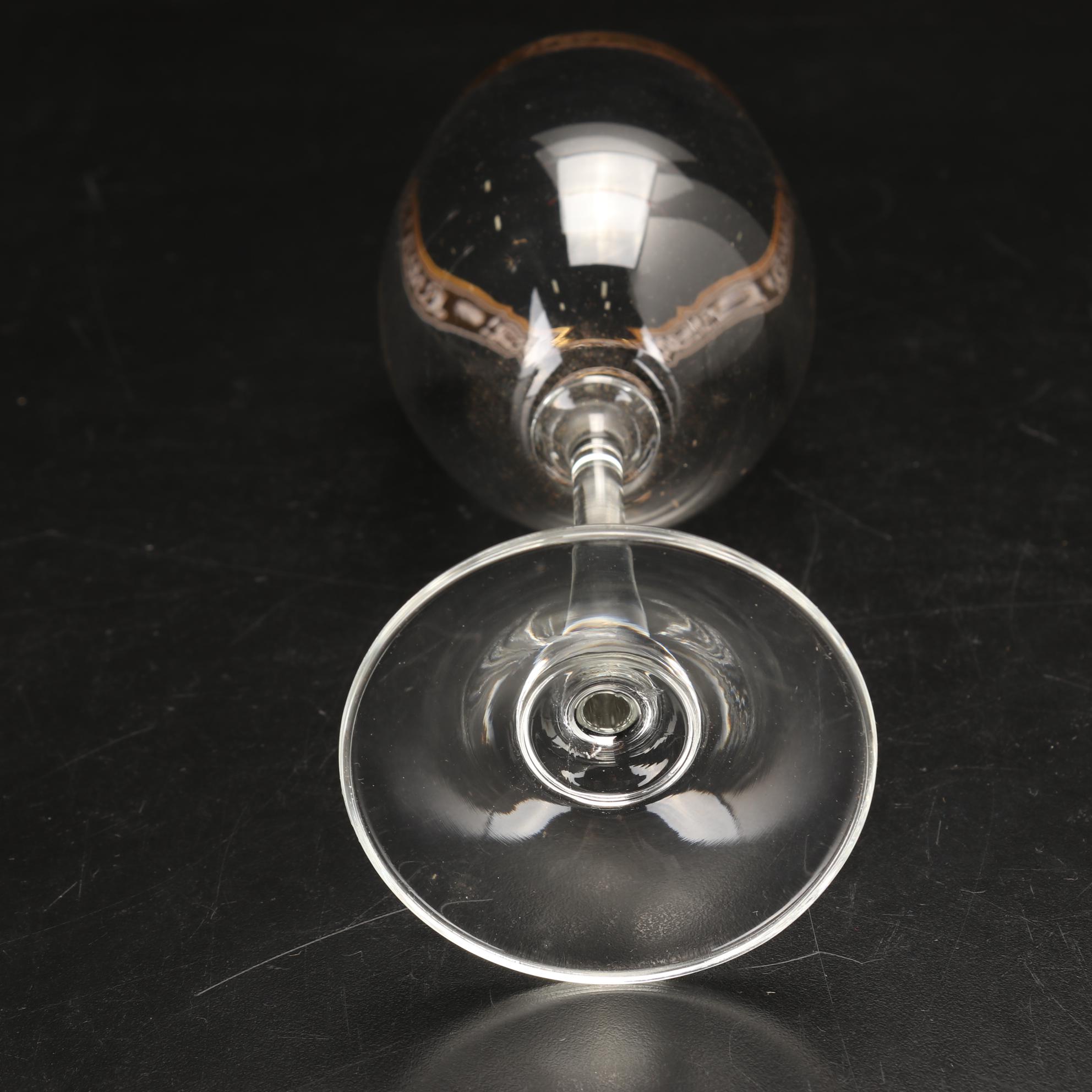 Blown Glass Bell Shaped Decanter with Other Gilt Rimmed Wine Glasses