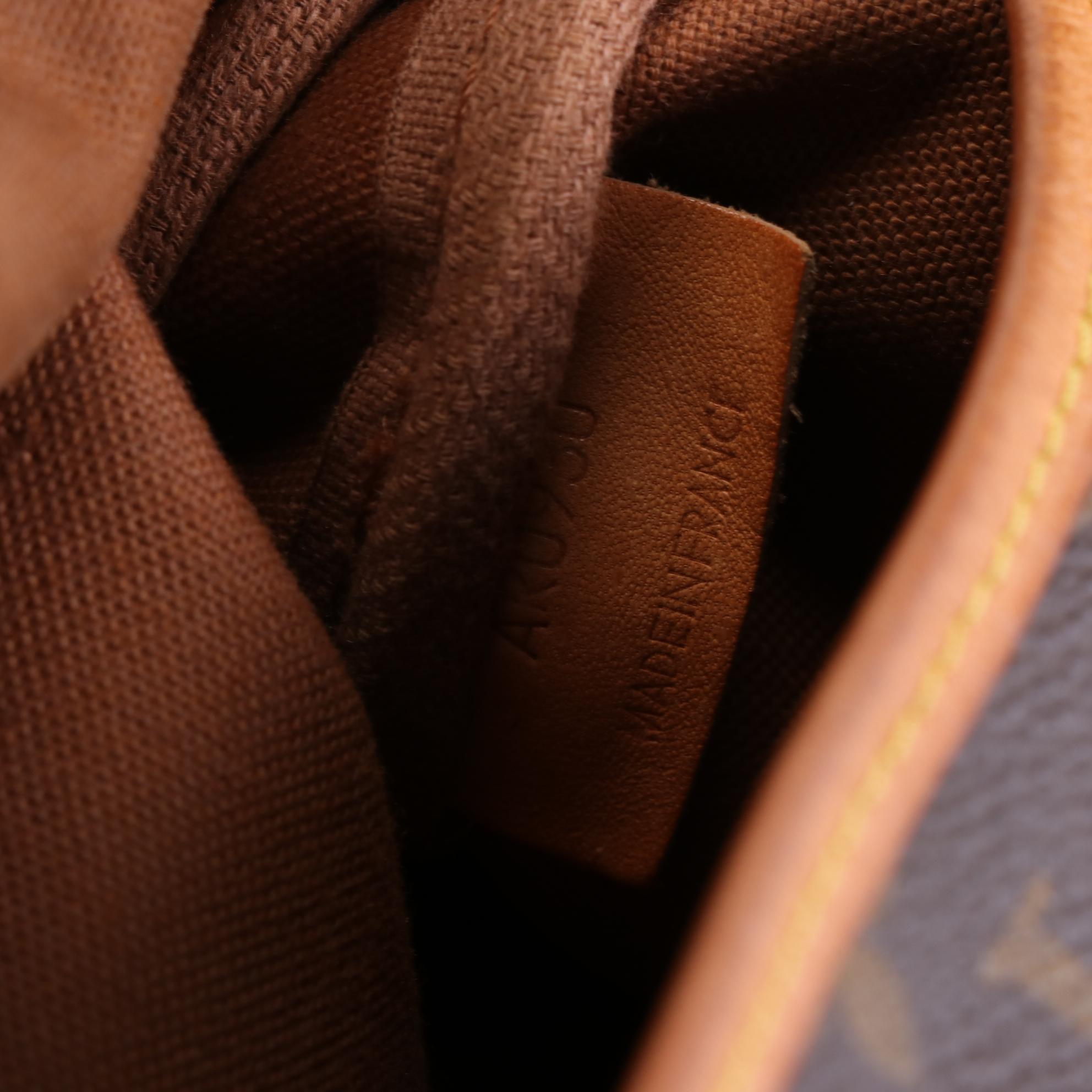 Louis Vuitton Saumur 30 in Monogram Canvas and Vachetta Leather