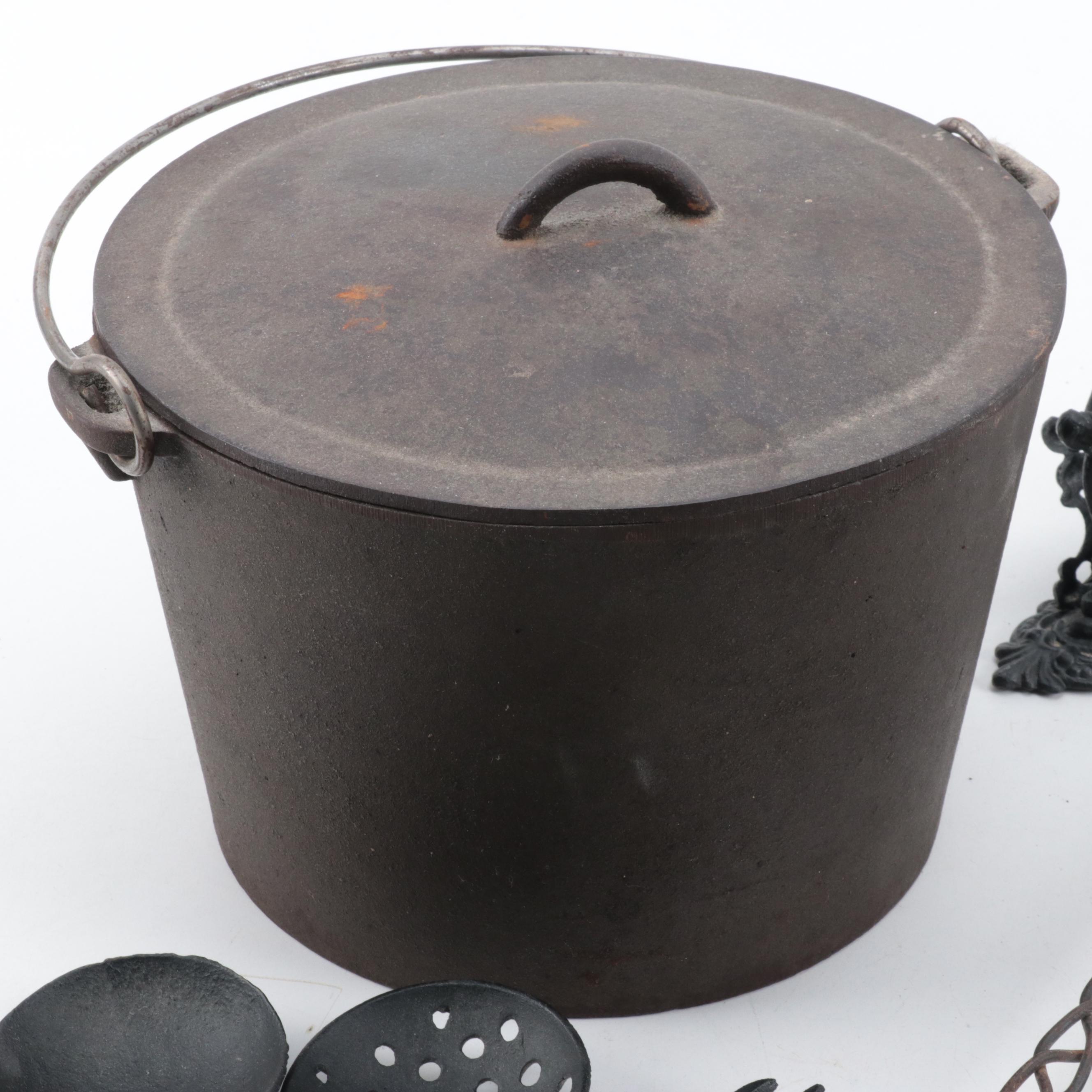 Cast Iron Lidded Pot, Cornbread Pan, Skillet, Rug Beater, Ice Tongs, and More