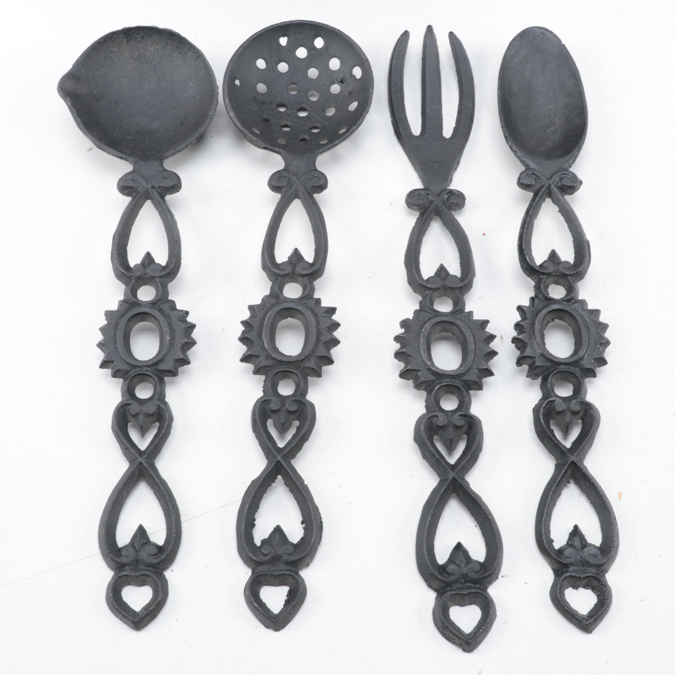 Cast Iron Lidded Pot, Cornbread Pan, Skillet, Rug Beater, Ice Tongs, and More