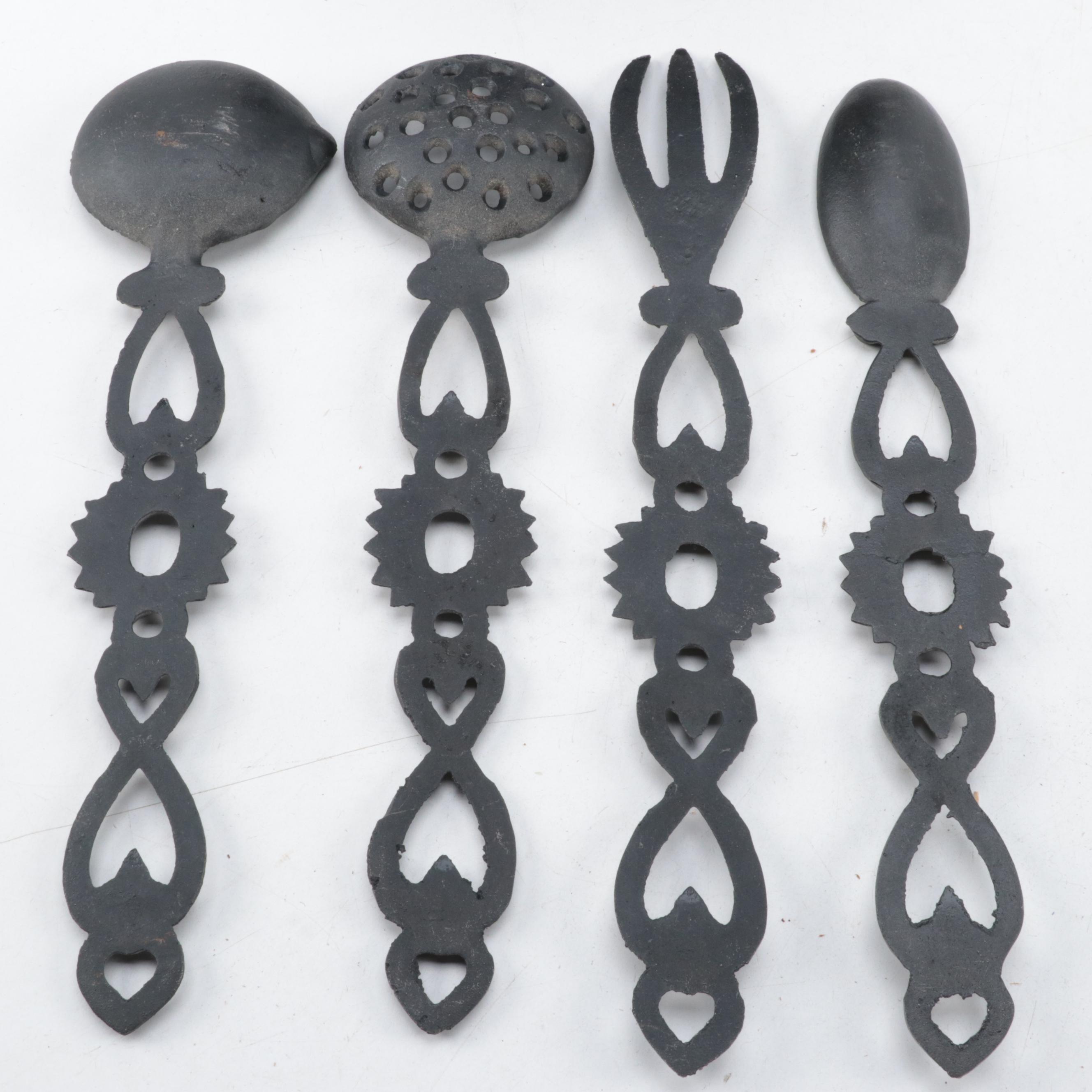 Cast Iron Lidded Pot, Cornbread Pan, Skillet, Rug Beater, Ice Tongs, and More
