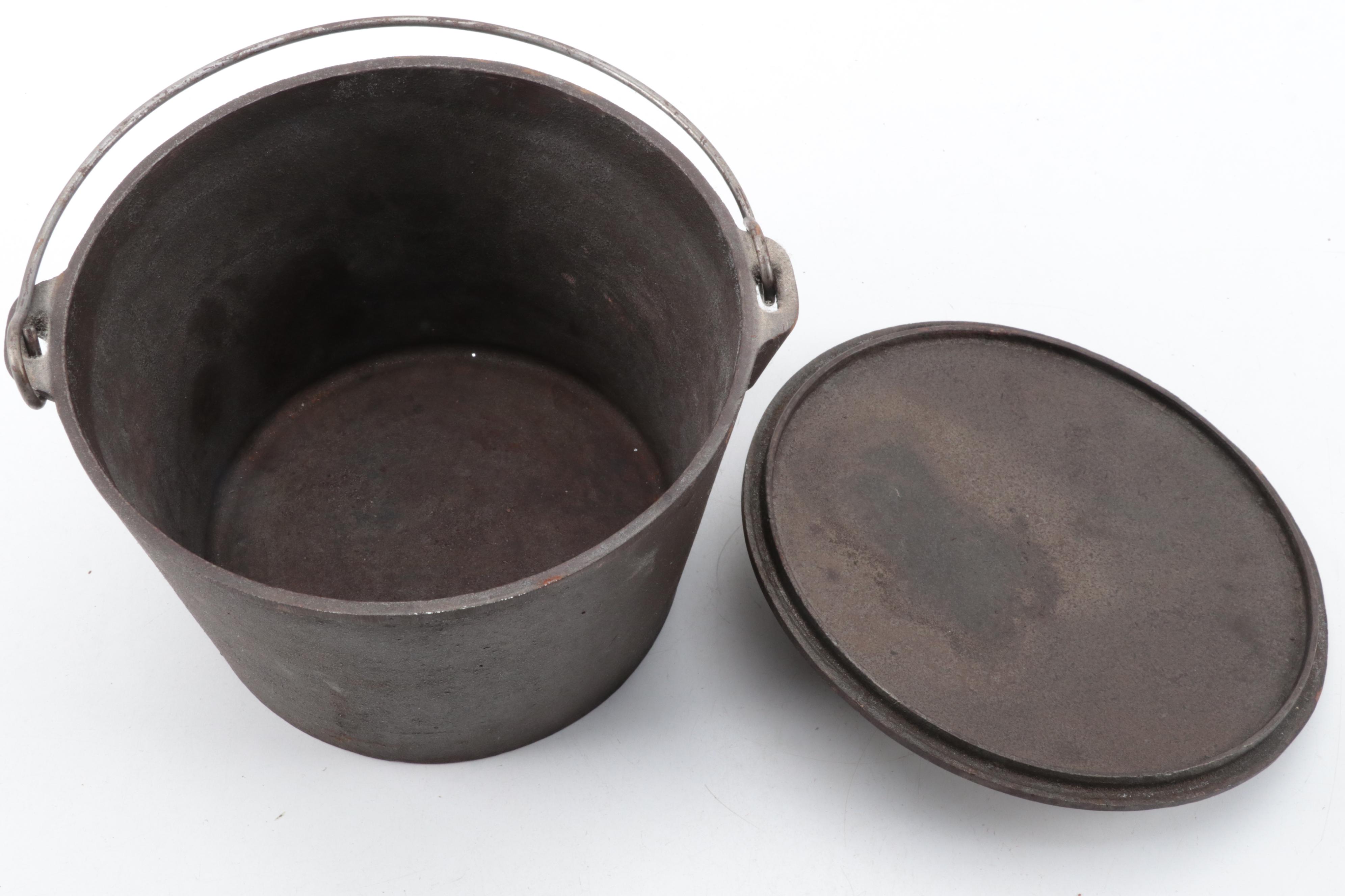 Cast Iron Lidded Pot, Cornbread Pan, Skillet, Rug Beater, Ice Tongs, and More
