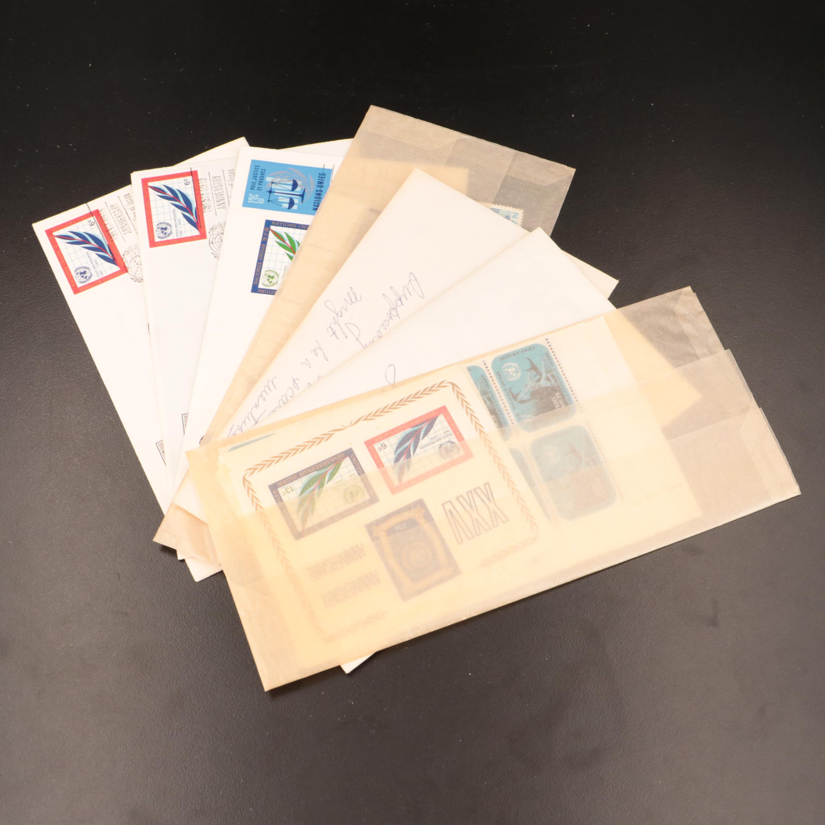 Assortment of U.S. Postage Stamps and Plate Blocks