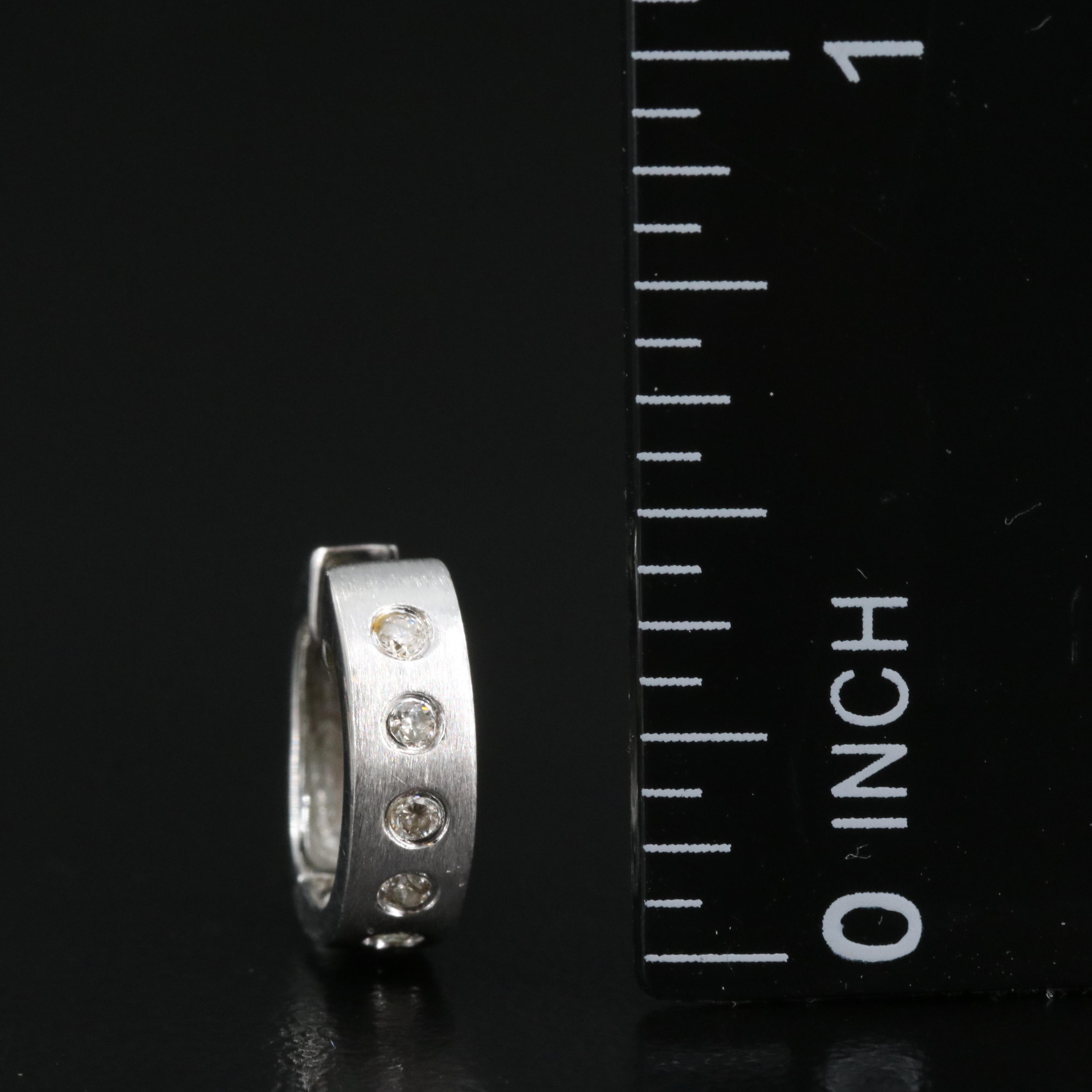 14K 0.16 CTW Diamond Huggie Earrings