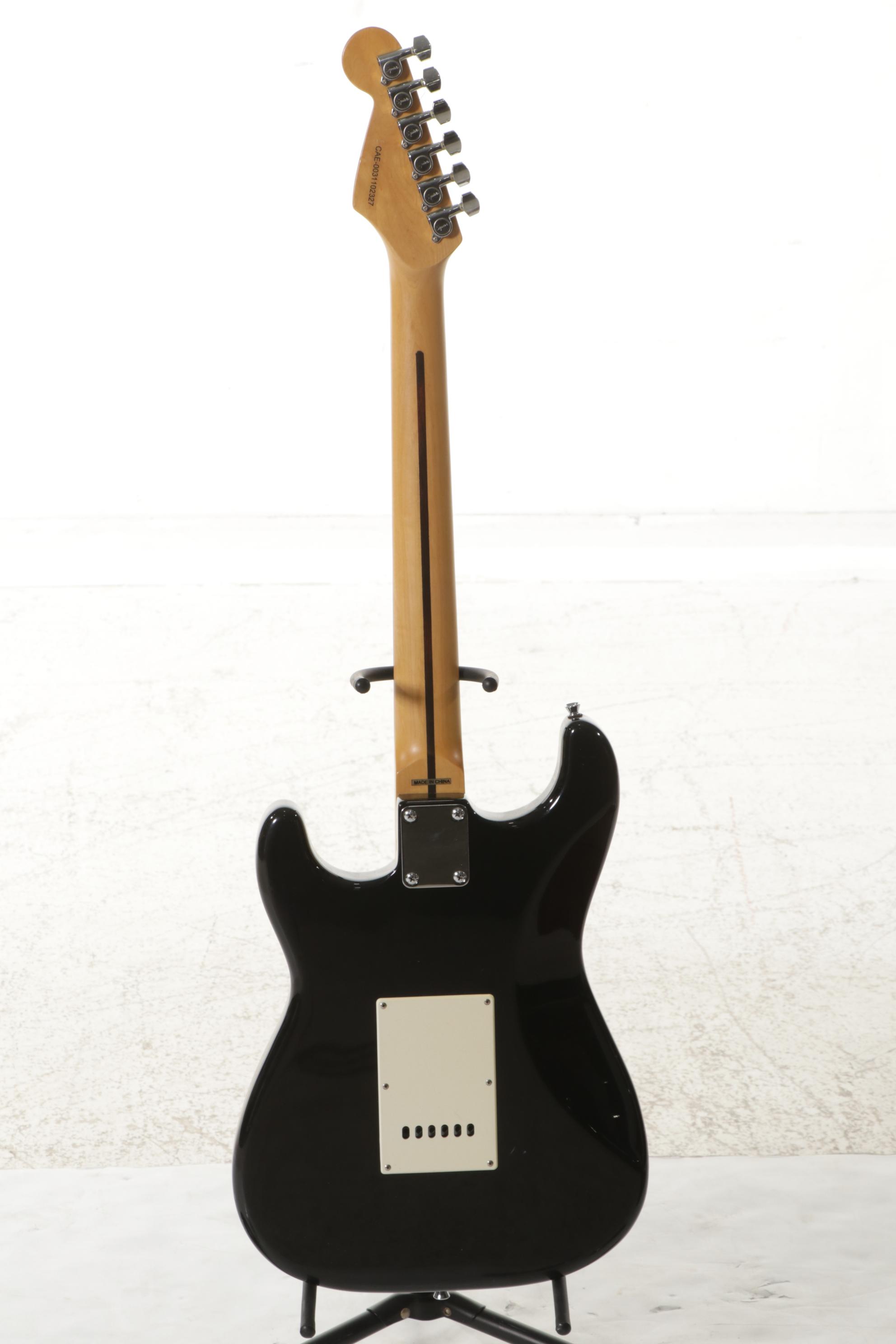 Squier Stratocaster by Fender Electric and Samick Greg Bennett Acoustic Guitars