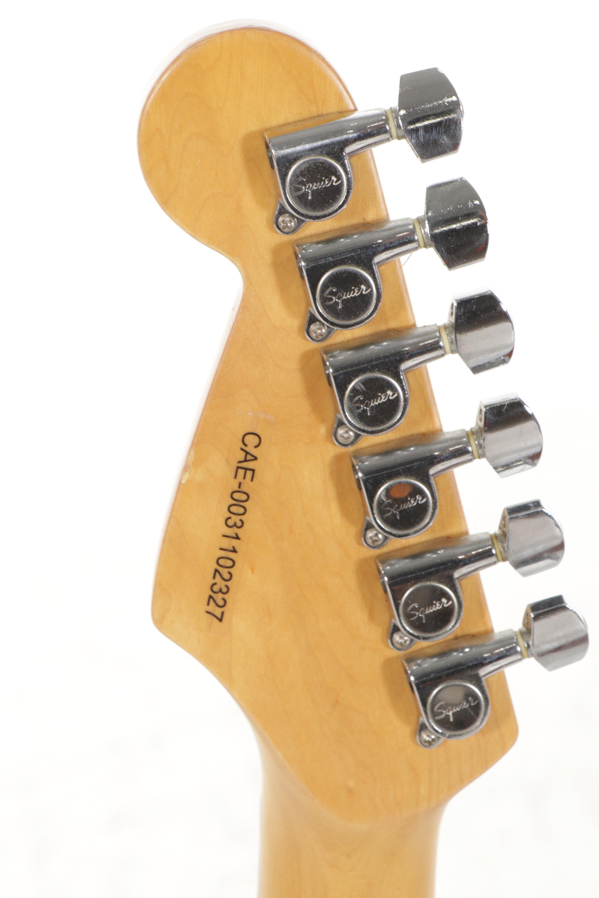 Squier Stratocaster by Fender Electric and Samick Greg Bennett Acoustic Guitars