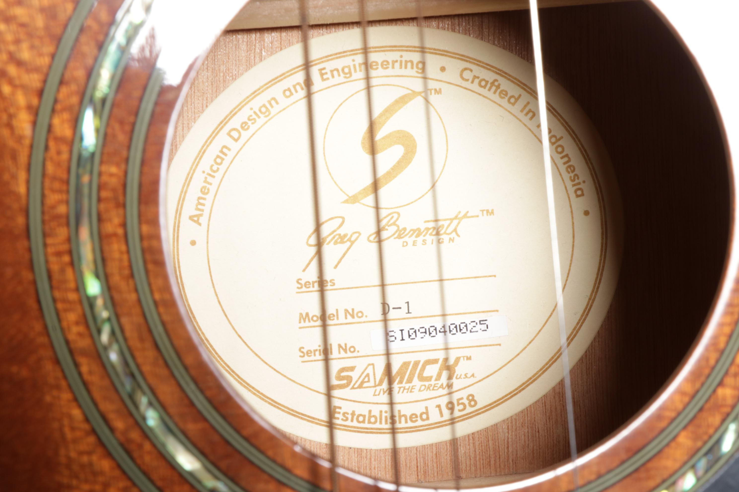 Squier Stratocaster by Fender Electric and Samick Greg Bennett Acoustic Guitars