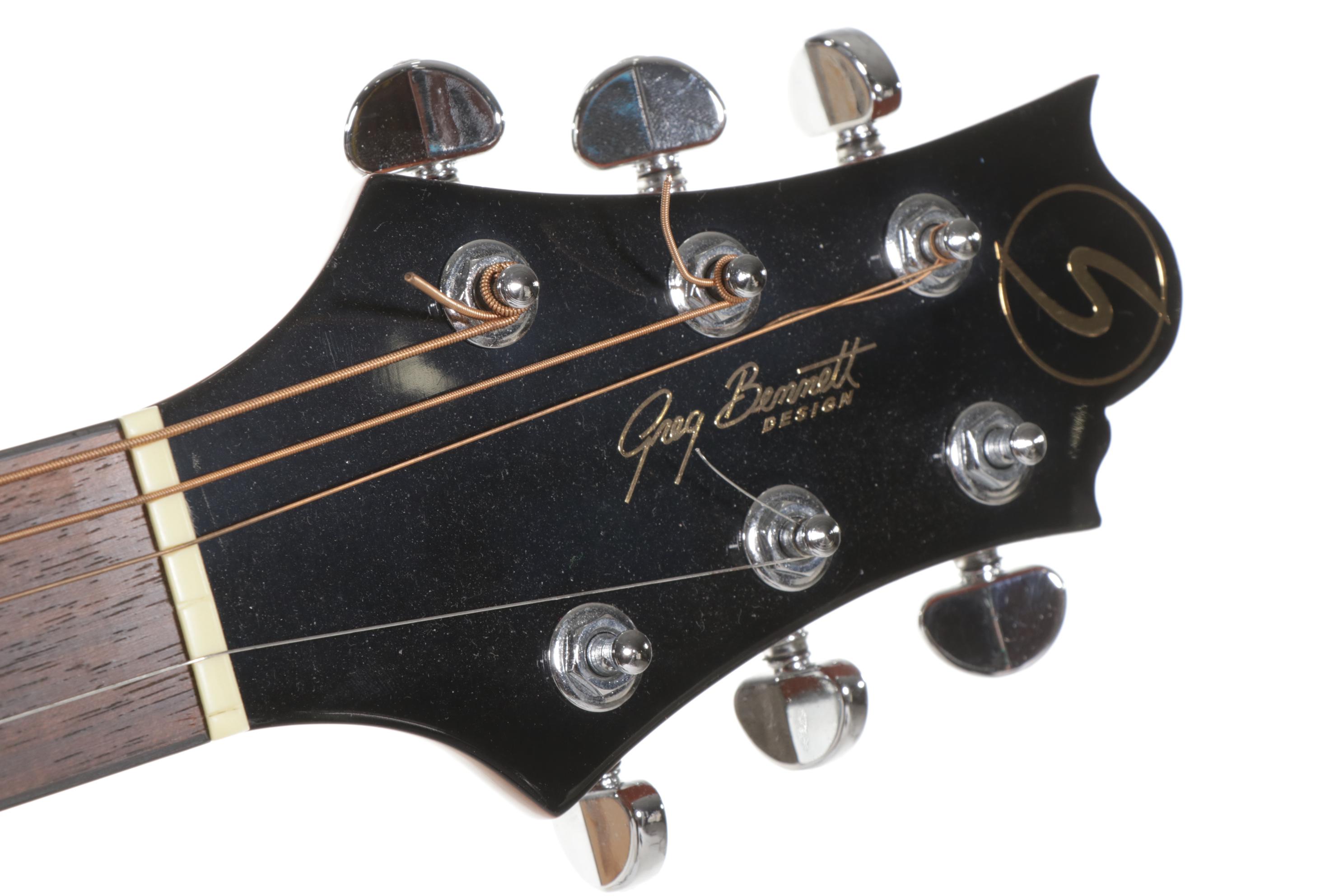 Squier Stratocaster by Fender Electric and Samick Greg Bennett Acoustic Guitars