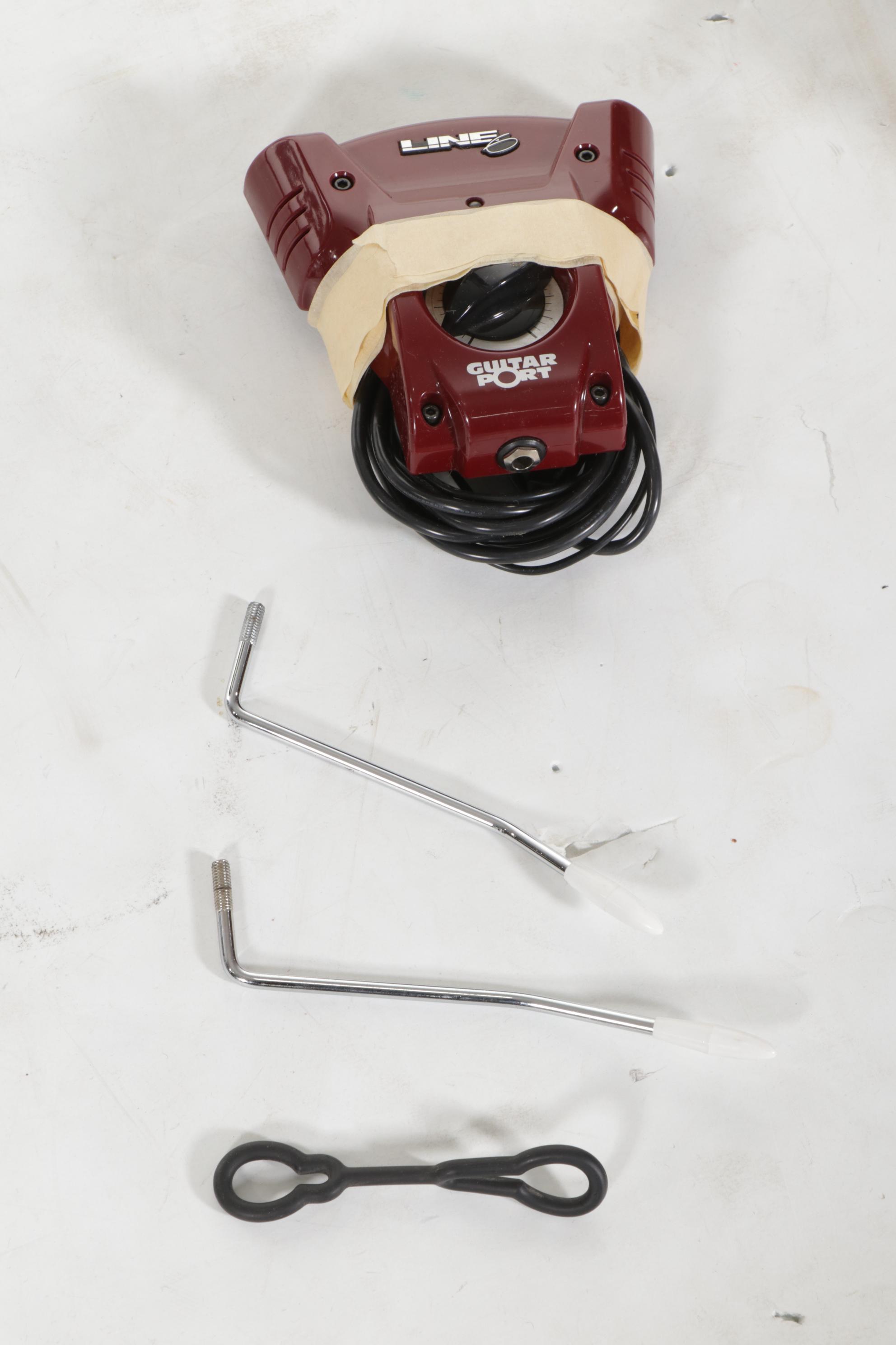 Squier Stratocaster by Fender Electric and Samick Greg Bennett Acoustic Guitars