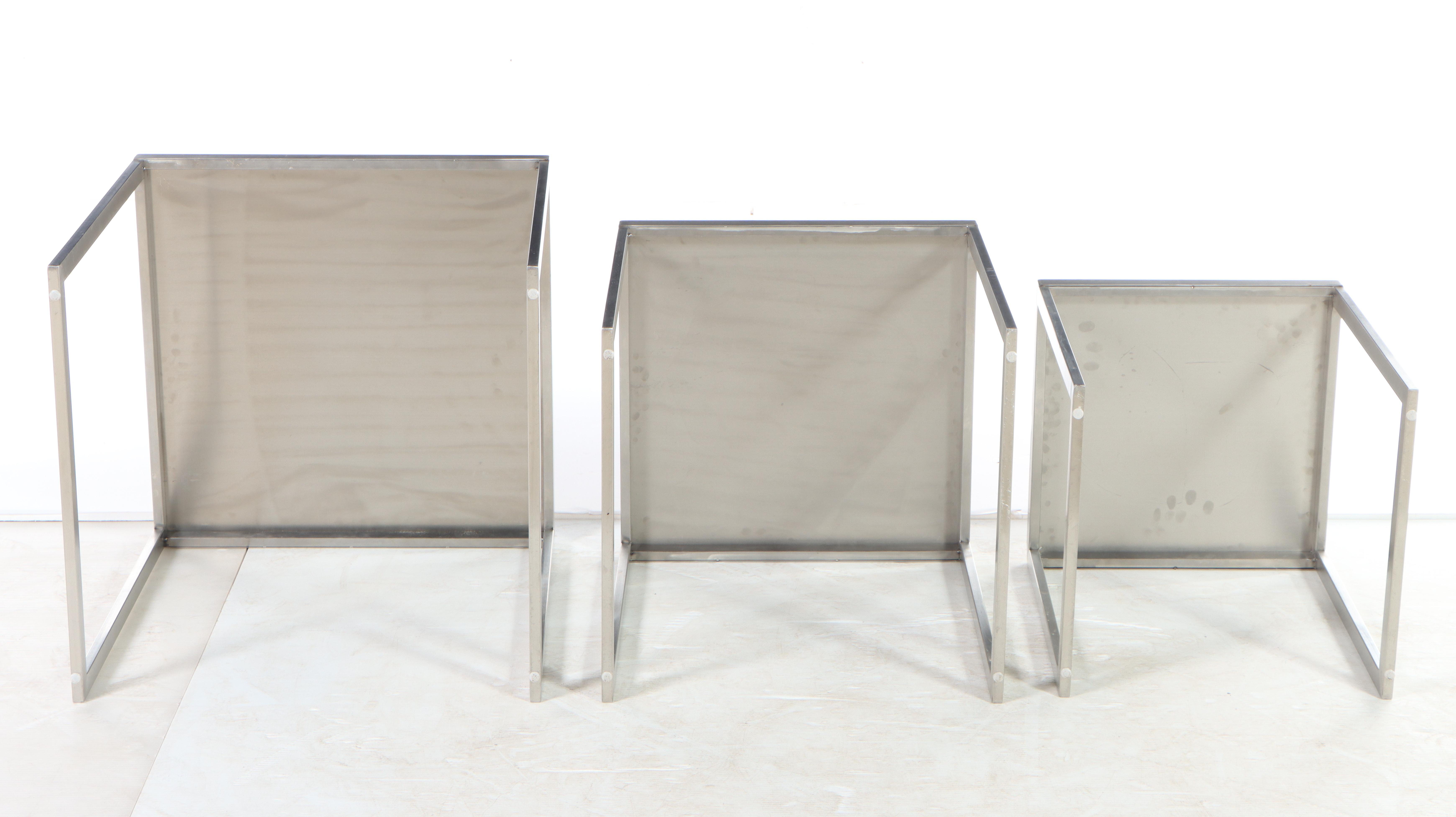Three Modernist Style Brushed Metal Nesting Tables