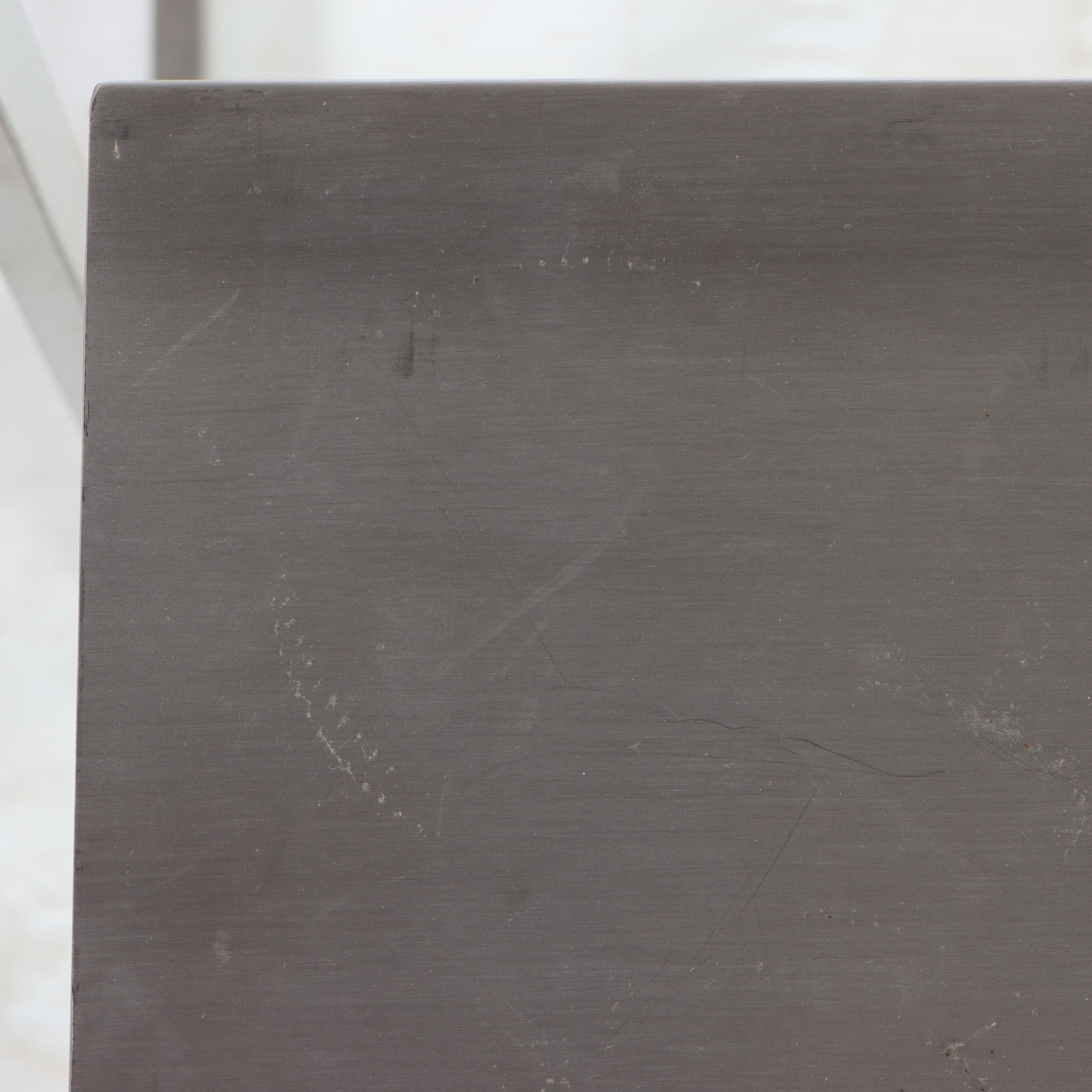 Three Modernist Style Brushed Metal Nesting Tables