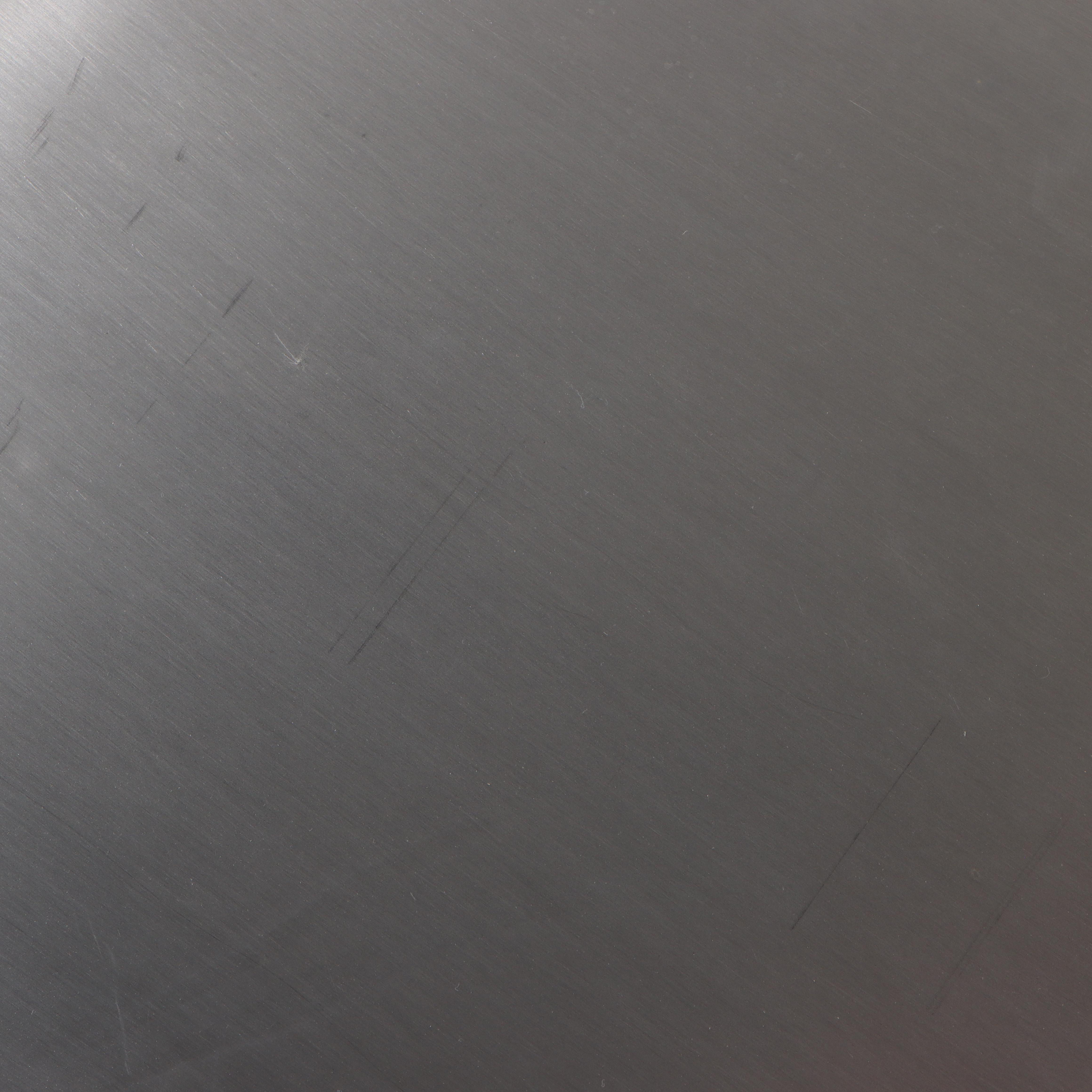 Three Modernist Style Brushed Metal Nesting Tables