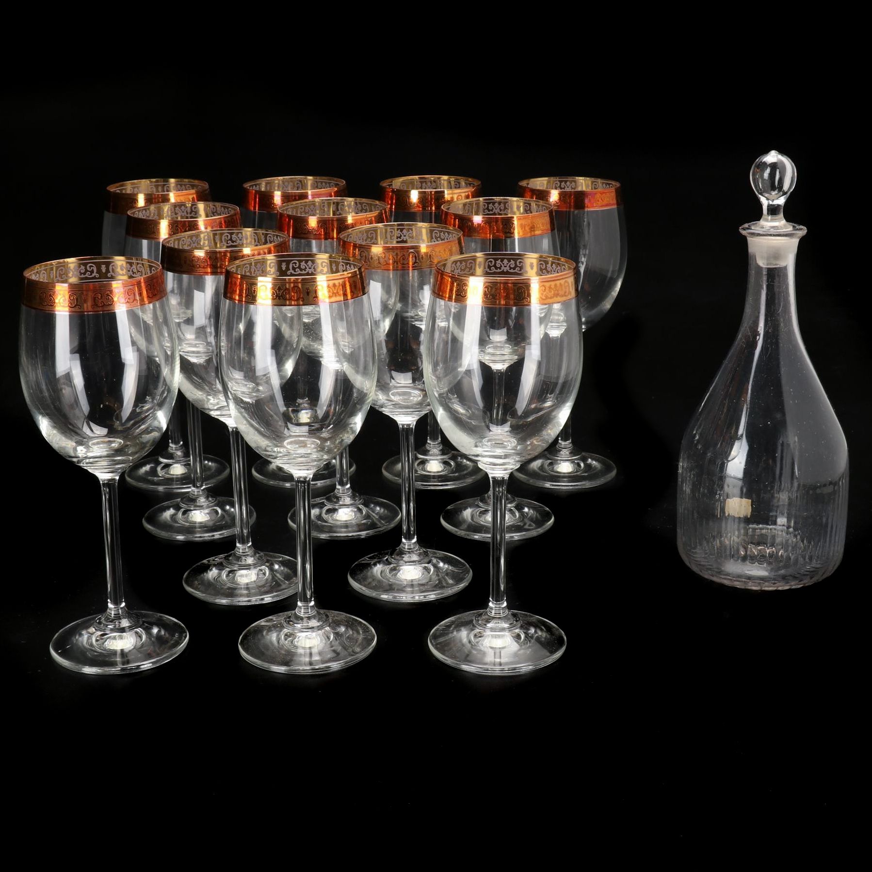 Blown Glass Bell Shaped Decanter with Other Gilt Rimmed Wine Glasses