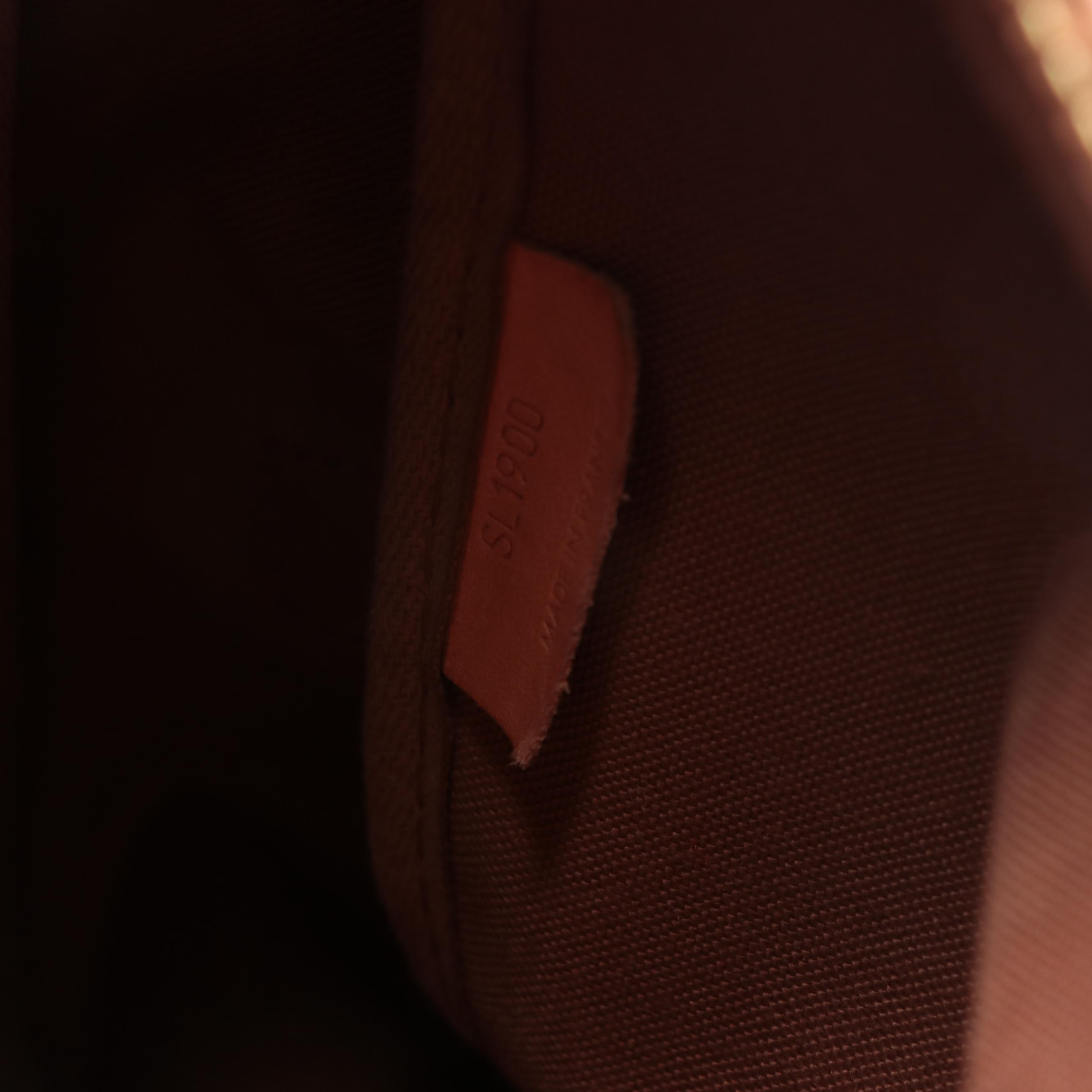 Louis Vuitton Saumur 43 Bag in Monogram Canvas and Vachetta Leather