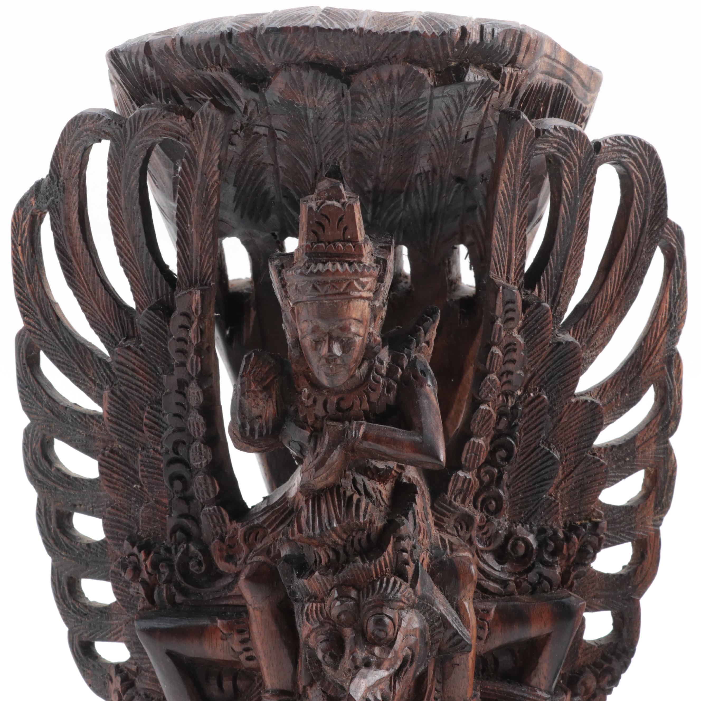 Indonesian Carved Wood Cili Masks and Vishnu Riding Garuda Sculptures