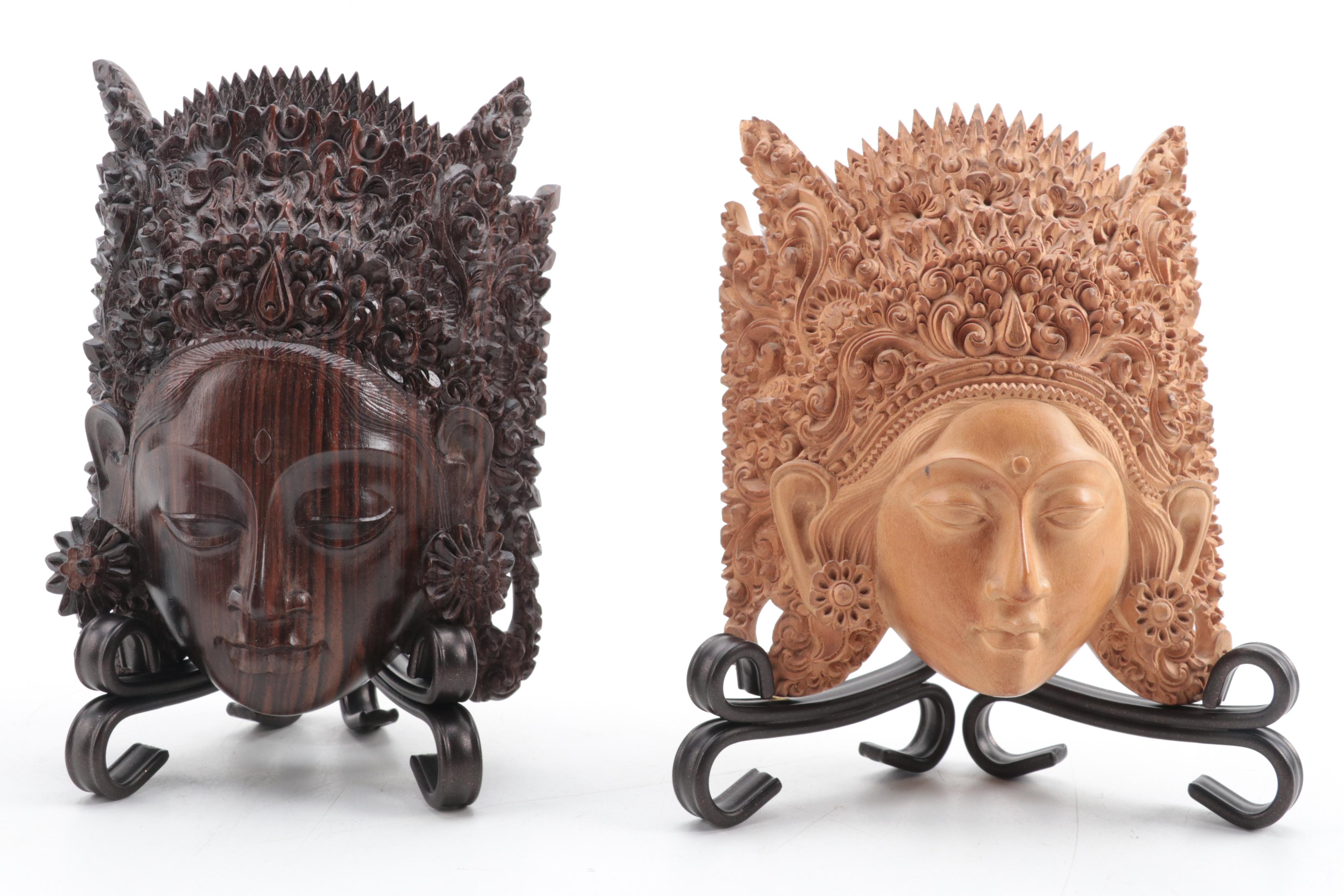 Indonesian Carved Wood Cili Masks and Vishnu Riding Garuda Sculptures