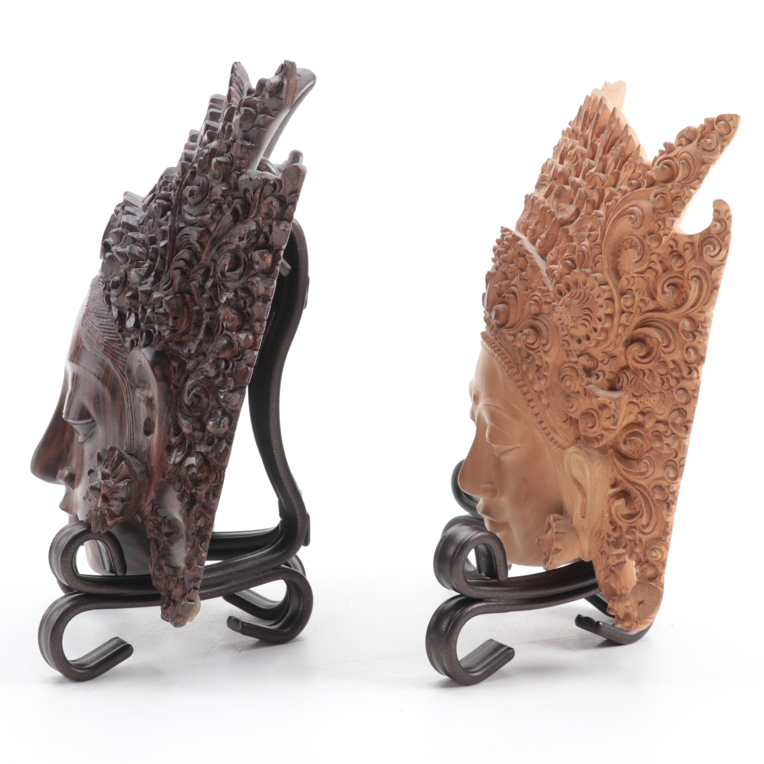 Indonesian Carved Wood Cili Masks and Vishnu Riding Garuda Sculptures