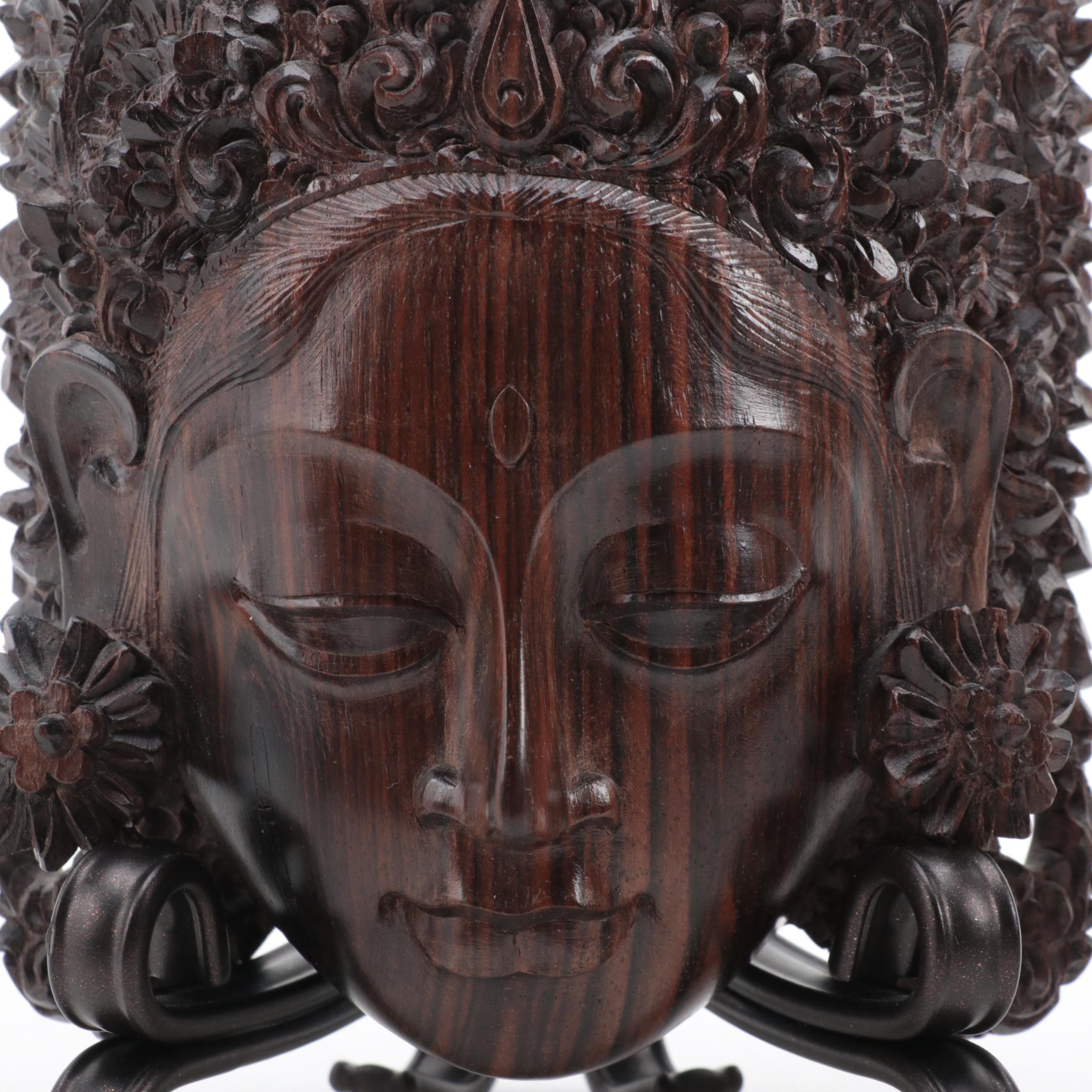Indonesian Carved Wood Cili Masks and Vishnu Riding Garuda Sculptures