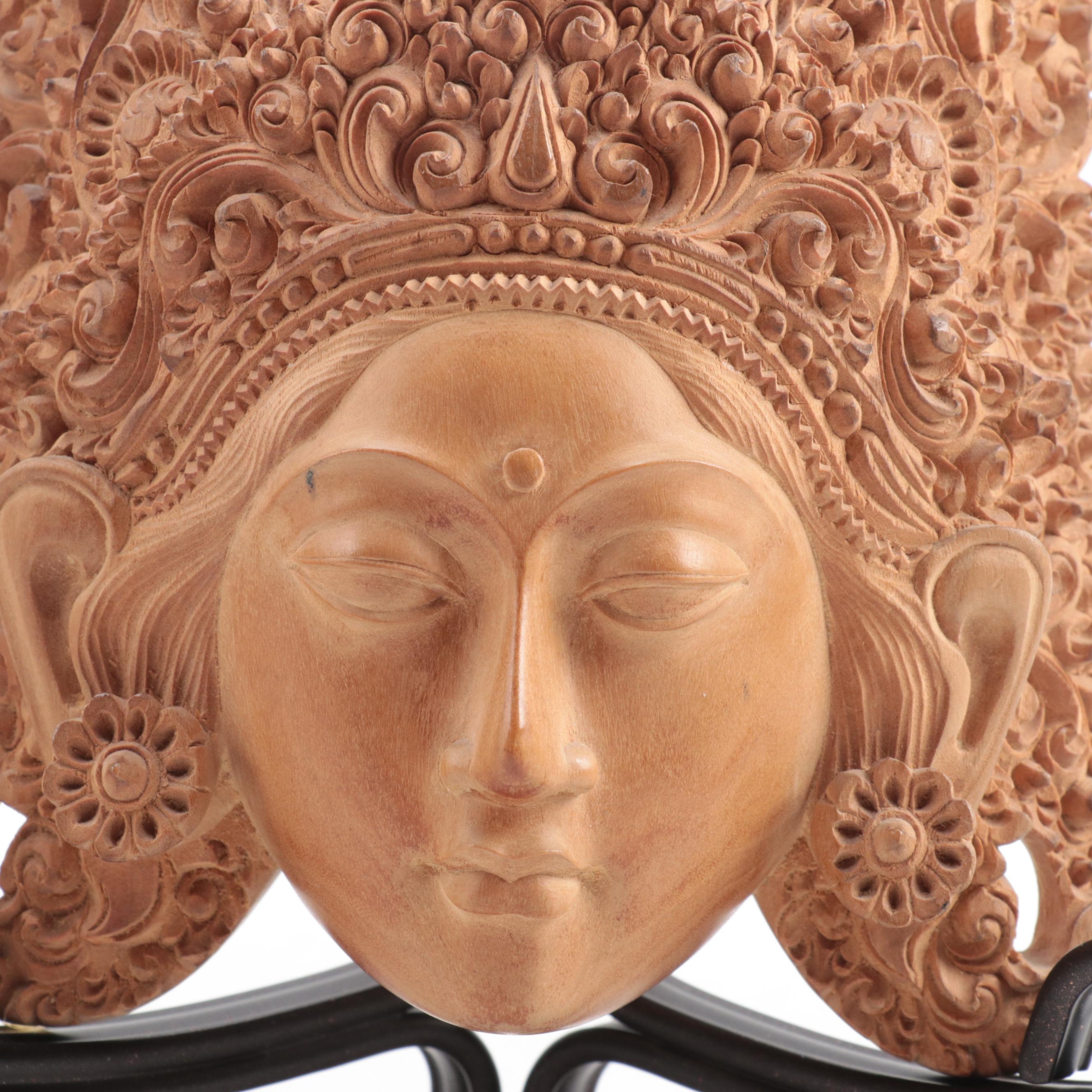 Indonesian Carved Wood Cili Masks and Vishnu Riding Garuda Sculptures