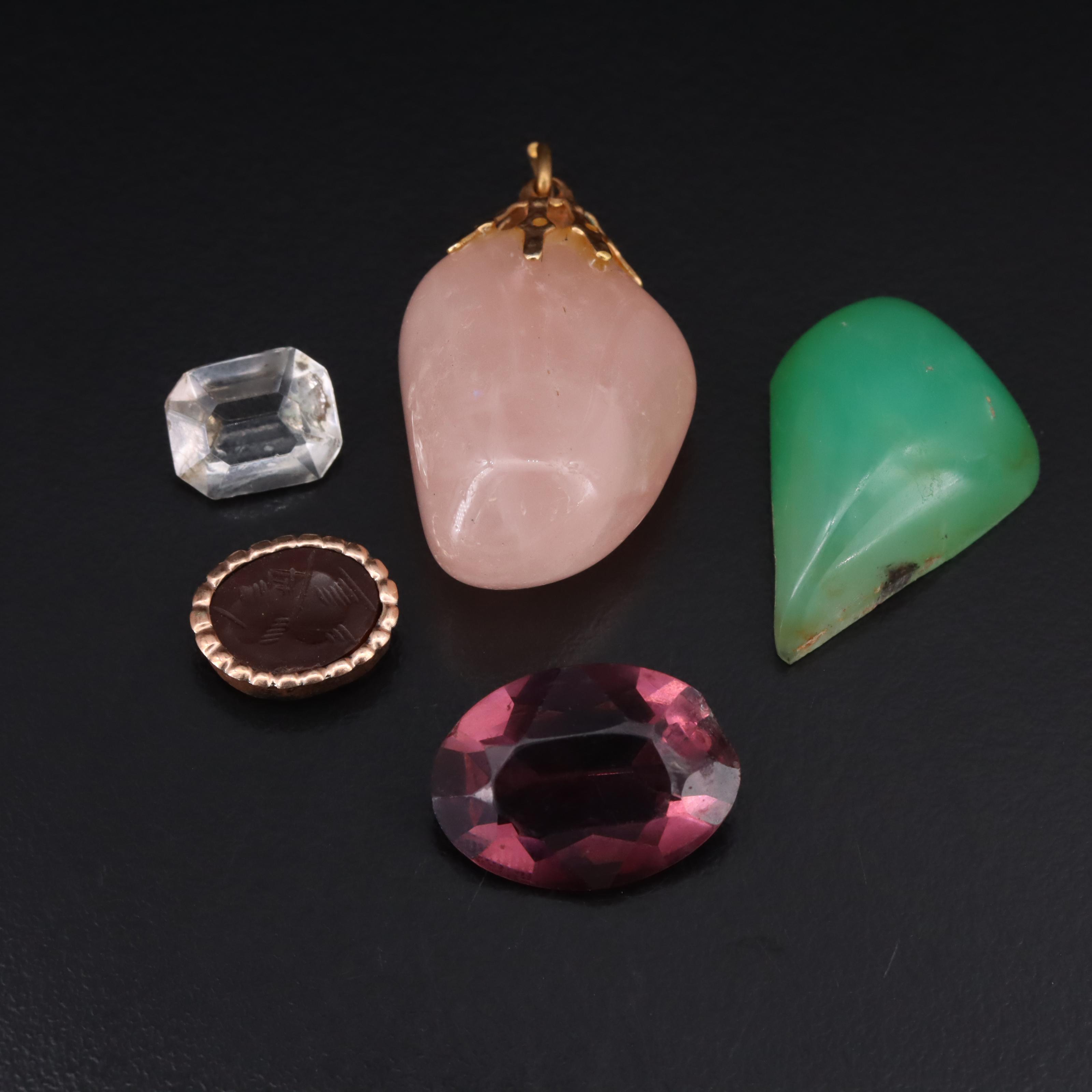 Loose Gemstones Including Rose Quartz and Topaz