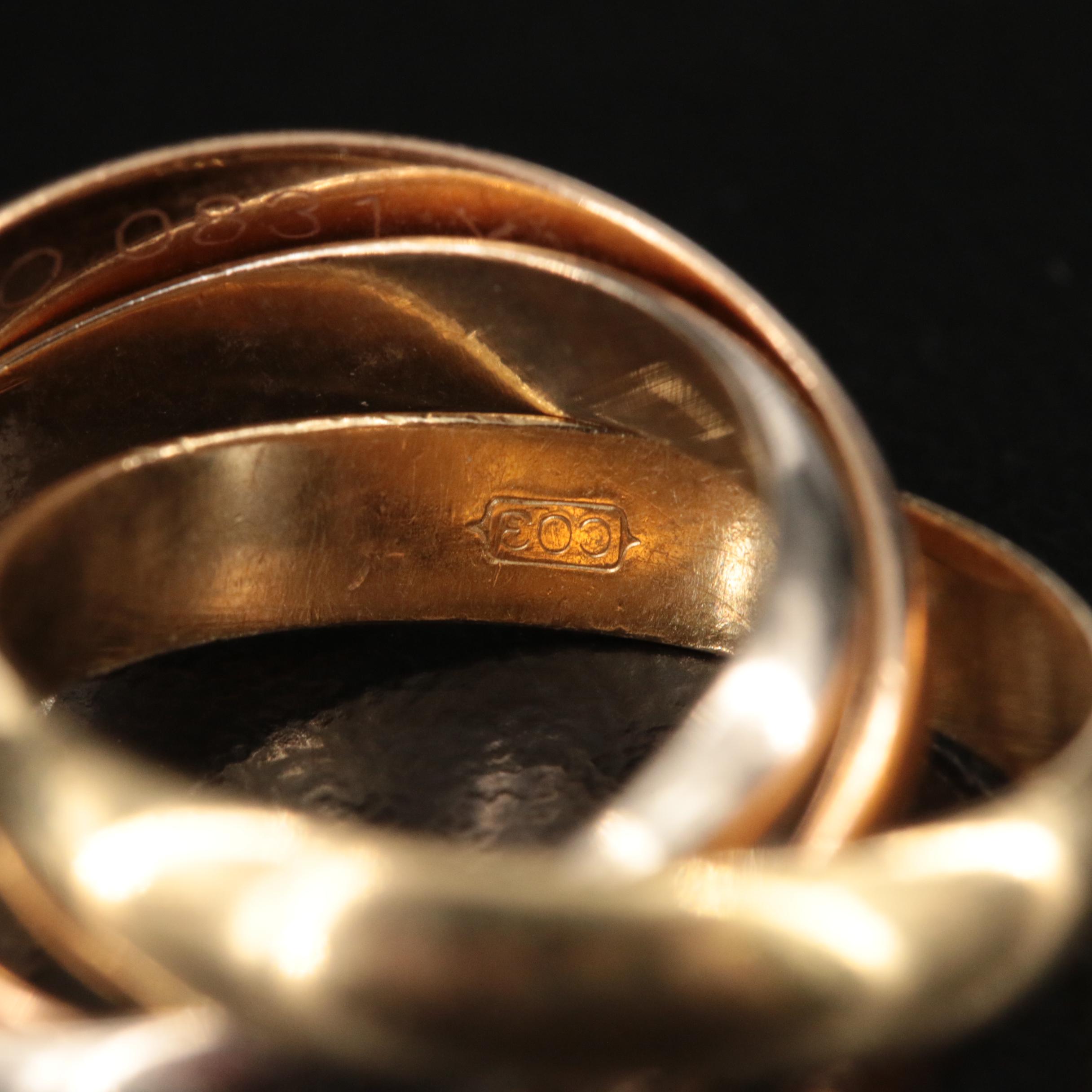 Les Must de Cartier 18K Tri-Color Trinity Rolling Ring