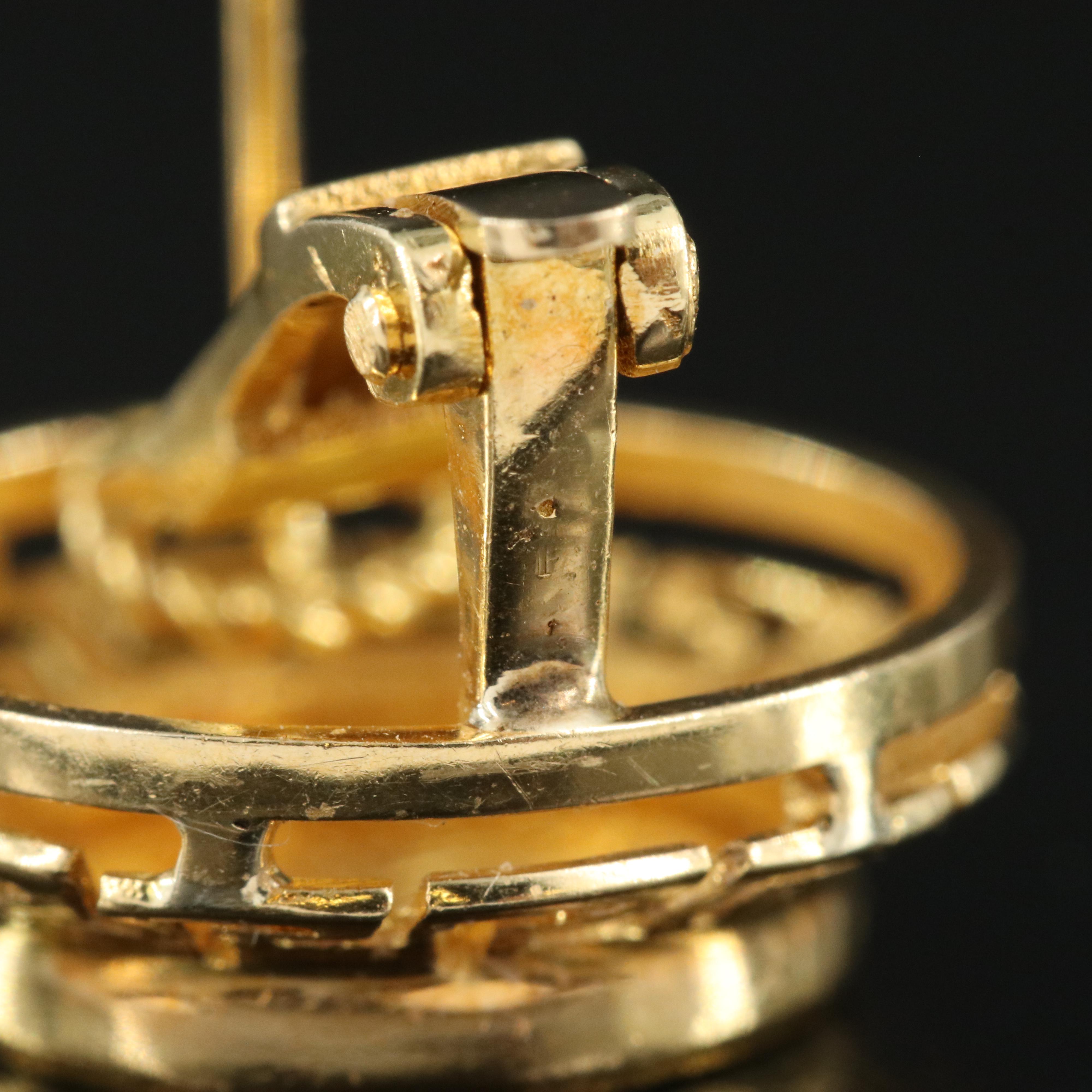 18K Earrings With a Gold Roman Style Coin and Greek Key Detail