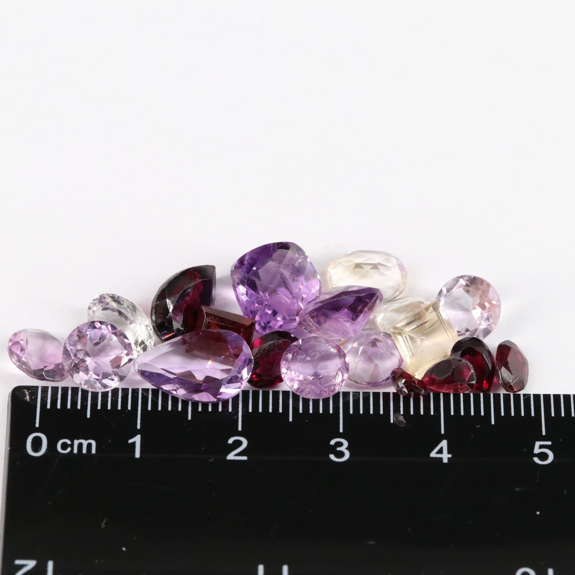 Loose 24.35 CTW Amethyst, Citrine and Garnet Lot