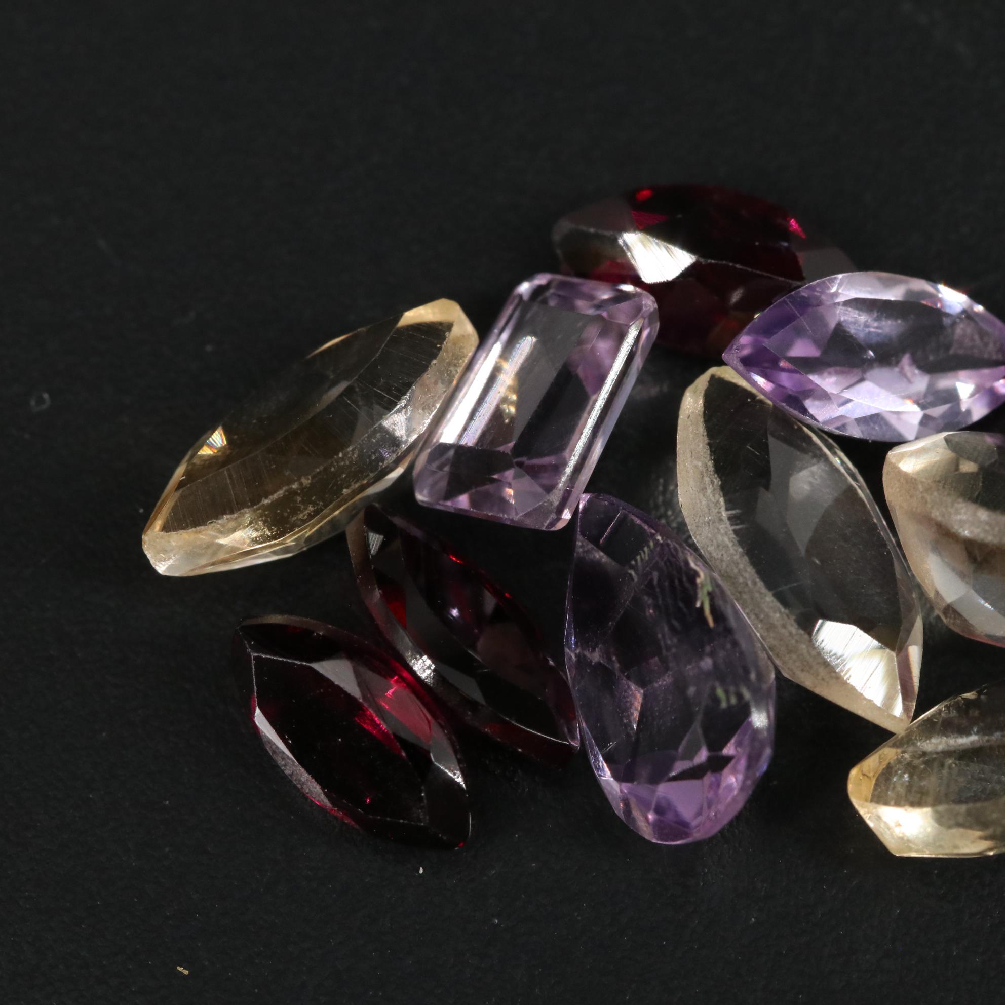 Loose 14.86 CTW Amethyst, Citrine, and Rhodolite Garnet Lot