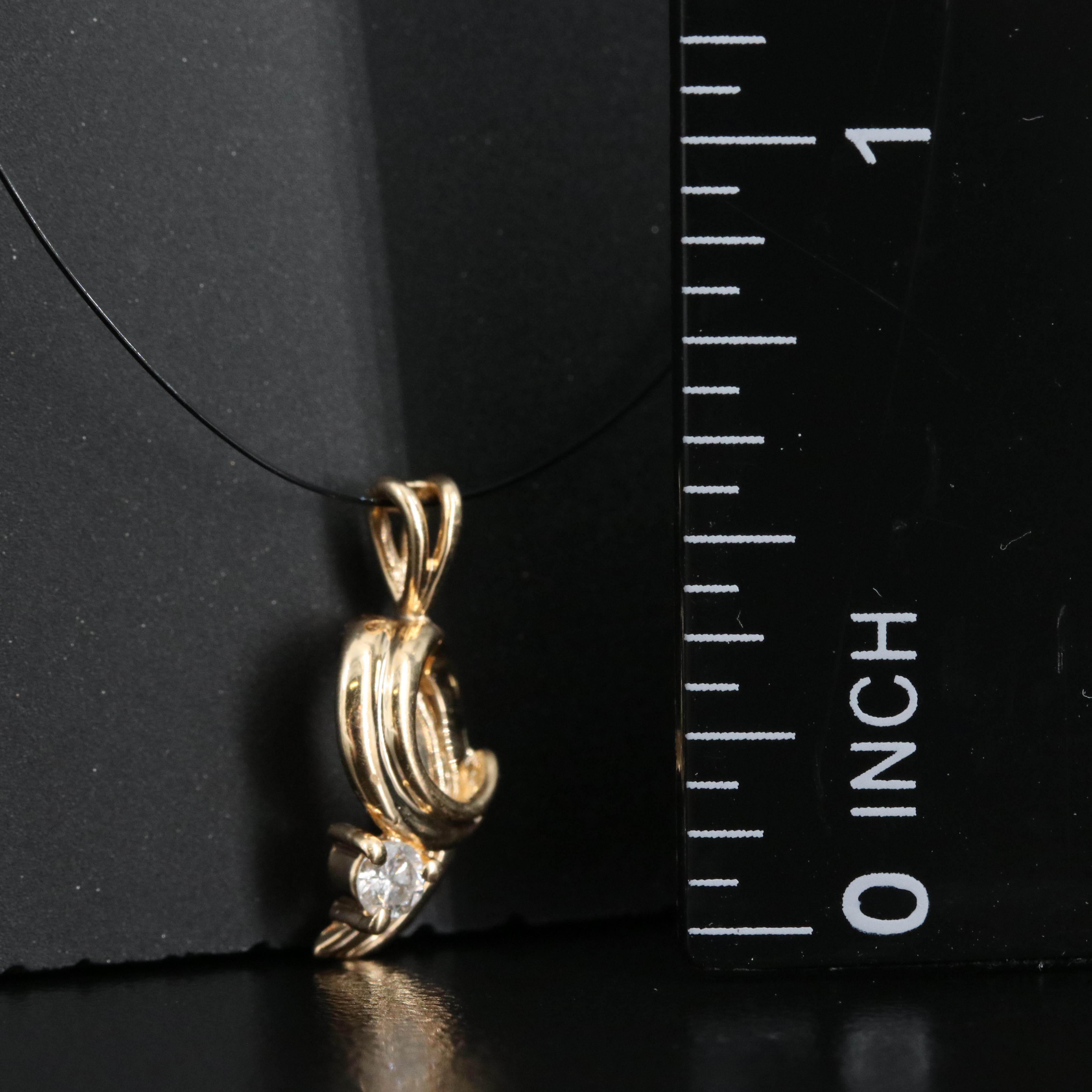 14K 0.06 CT Diamond Pendant