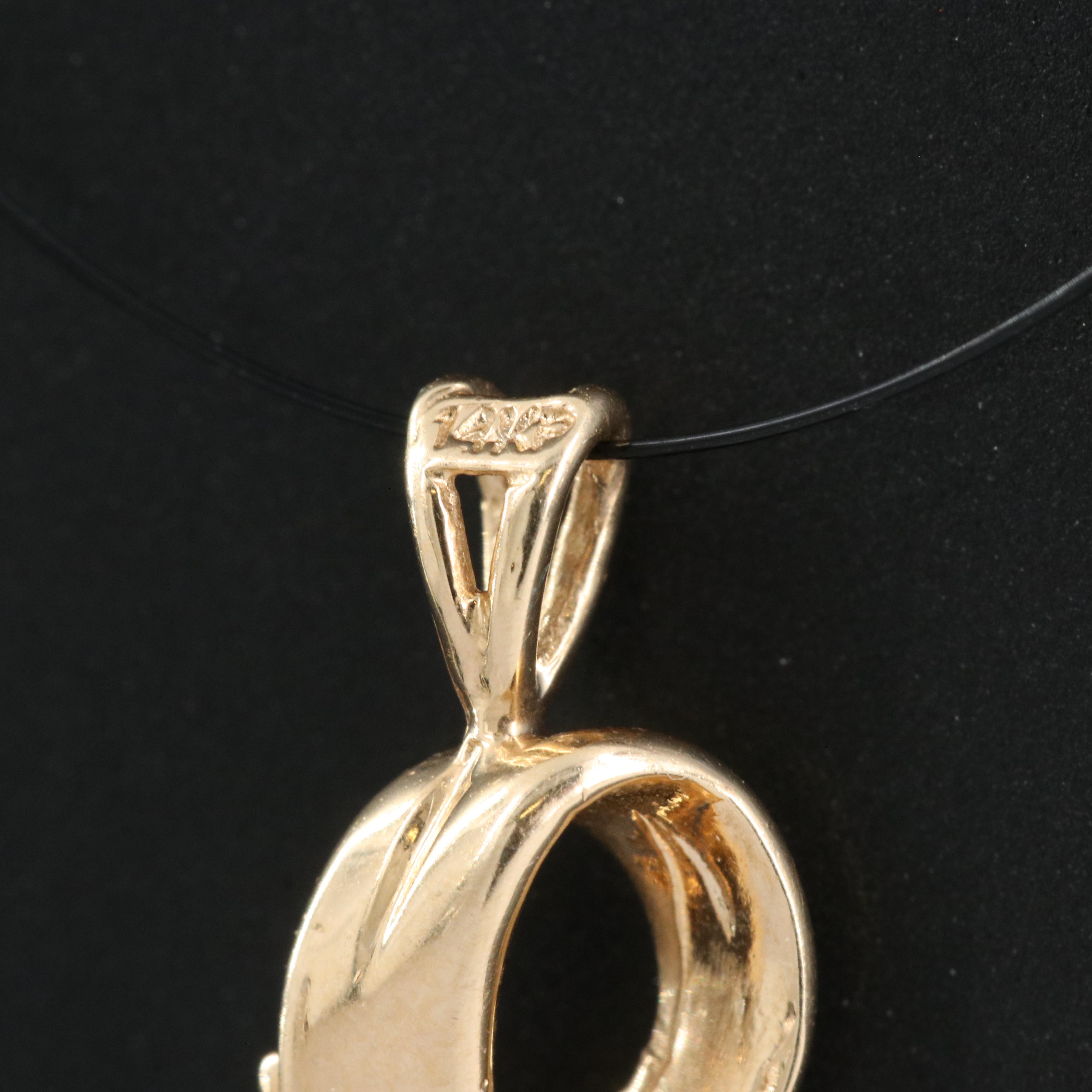 14K 0.06 CT Diamond Pendant