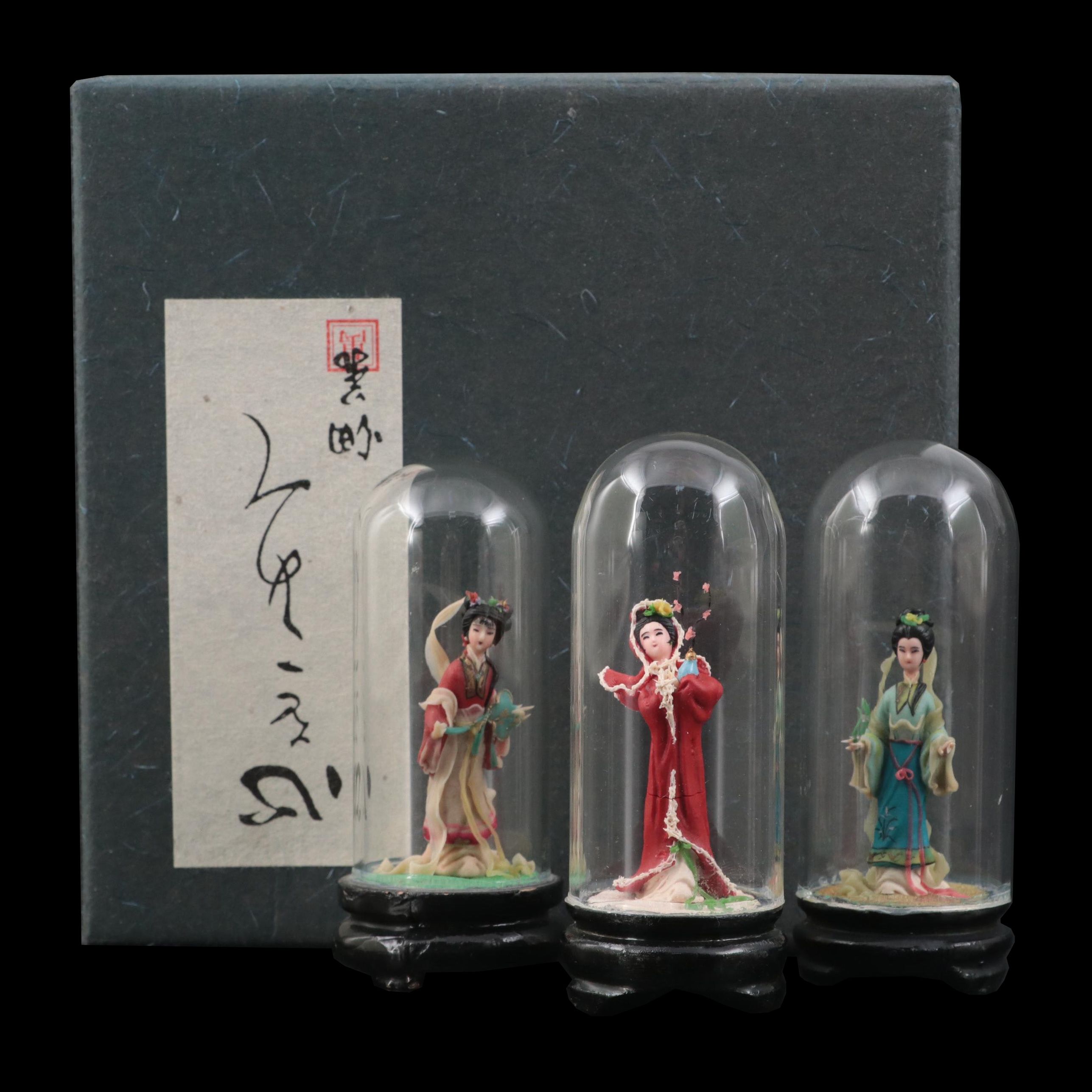 Chinese Clay Figurines in Glass Cloches