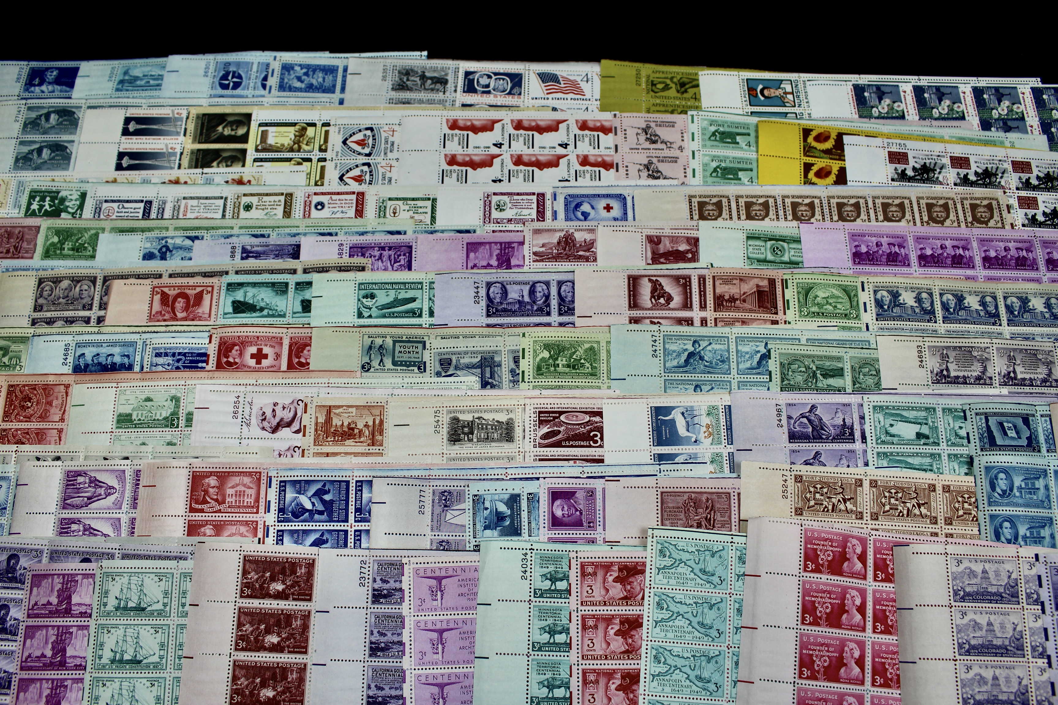 Ninety-Two U.S. Postage Stamp Sheets, 1940s to 1960s