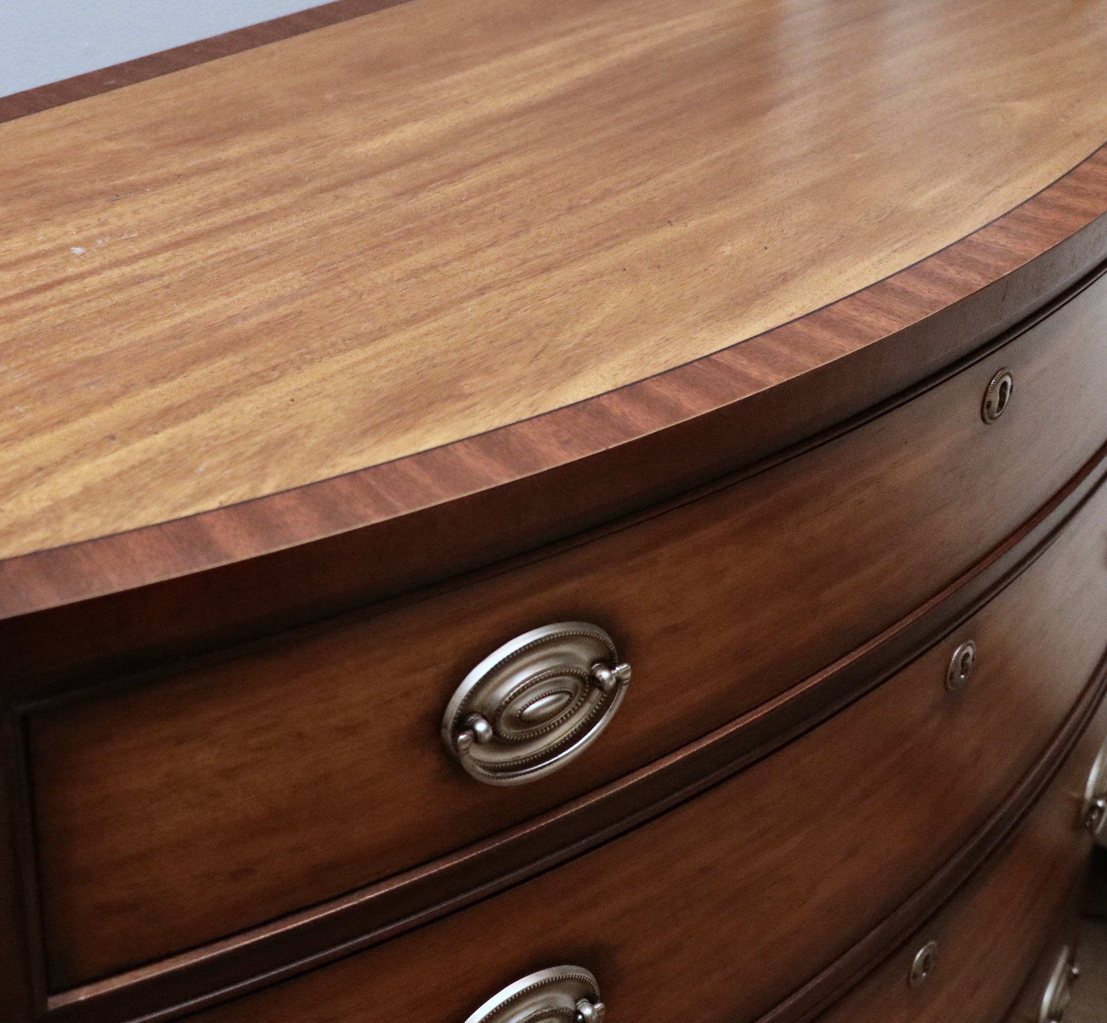 Ethan Allen "Lawson" Bowfront Mahogany and Walnut Chest of Drawers