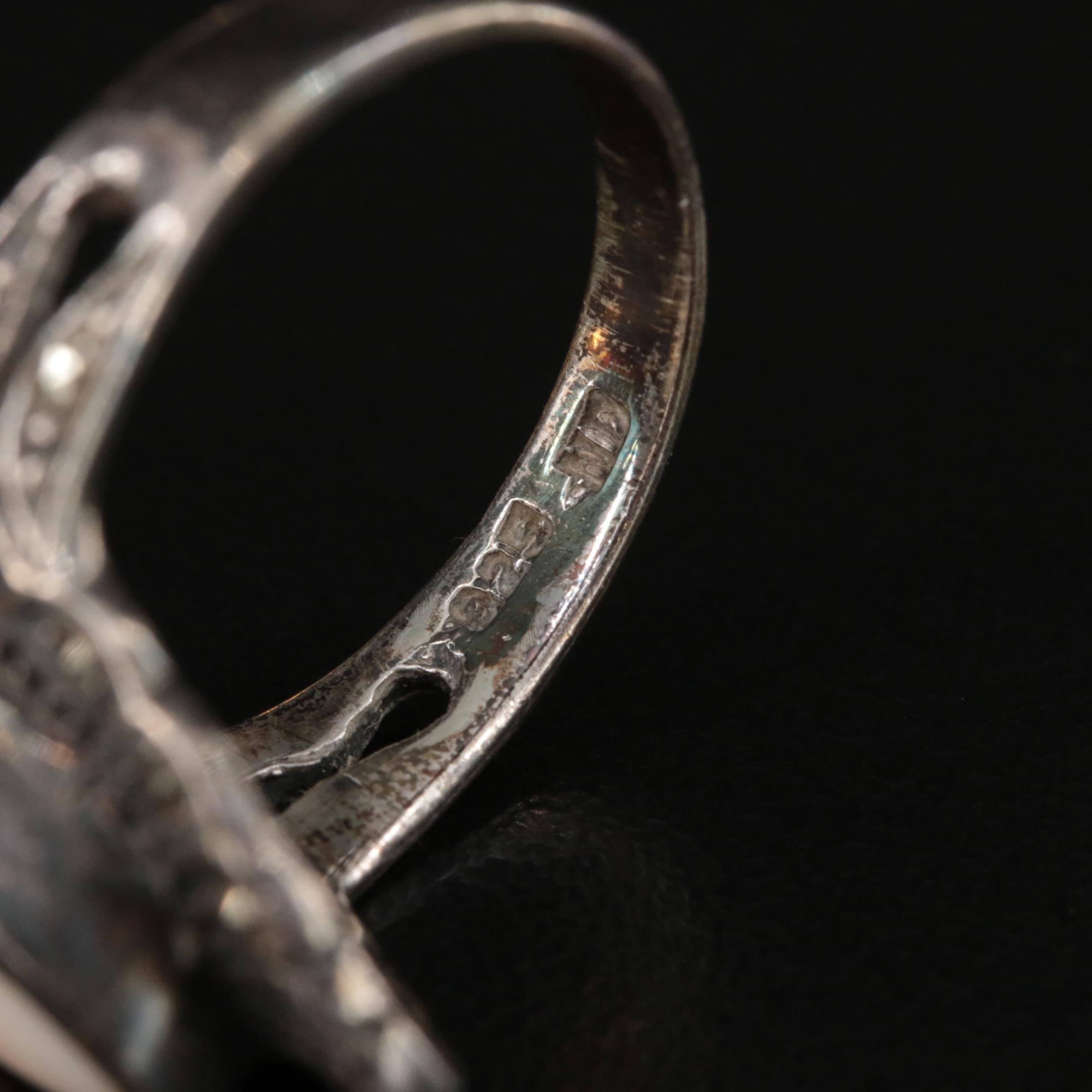 Sterling Ring Grouping Including Mother-of- Pearl and Rhinestone