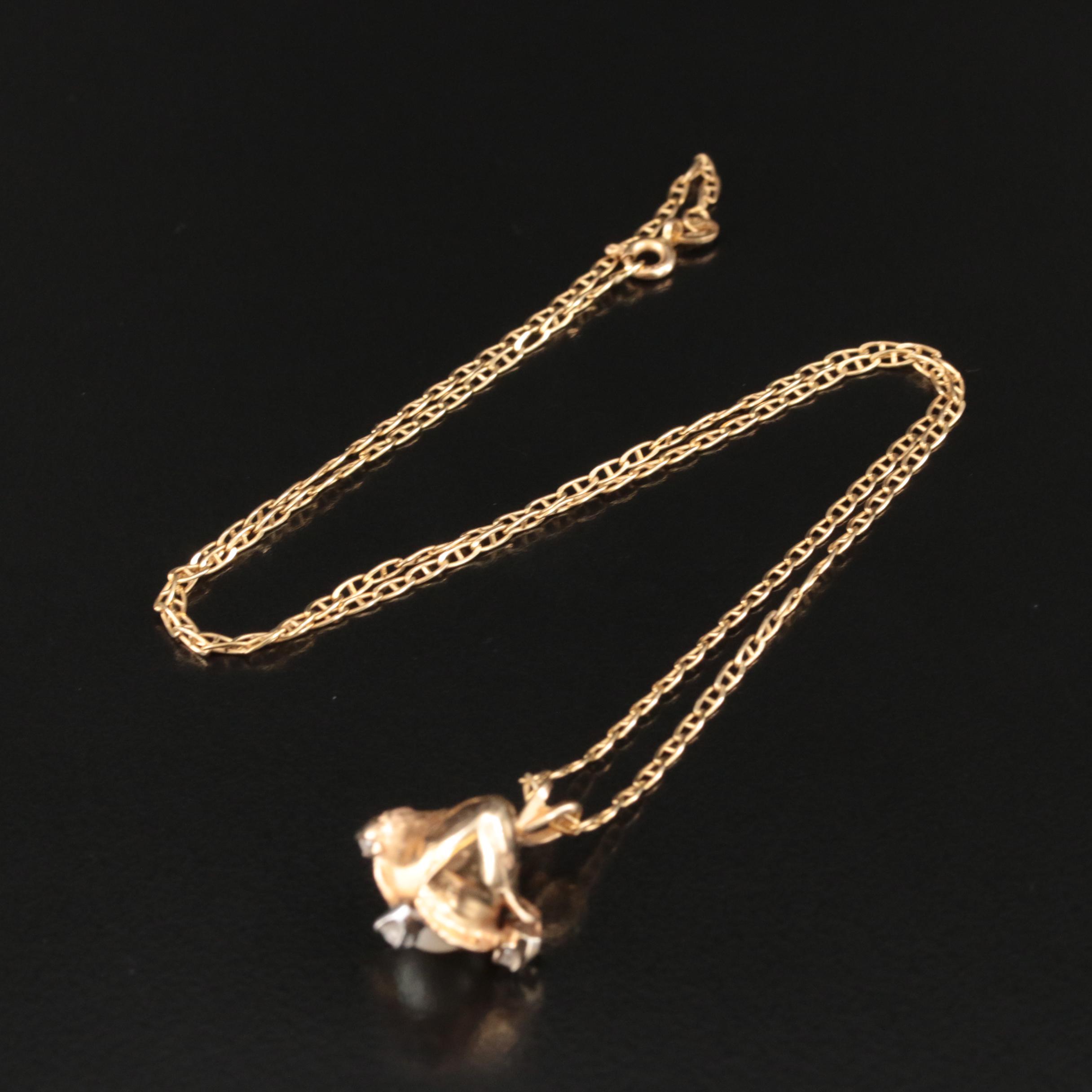 Vintage 14K Pearl and Diamond Knot Pendant Necklace