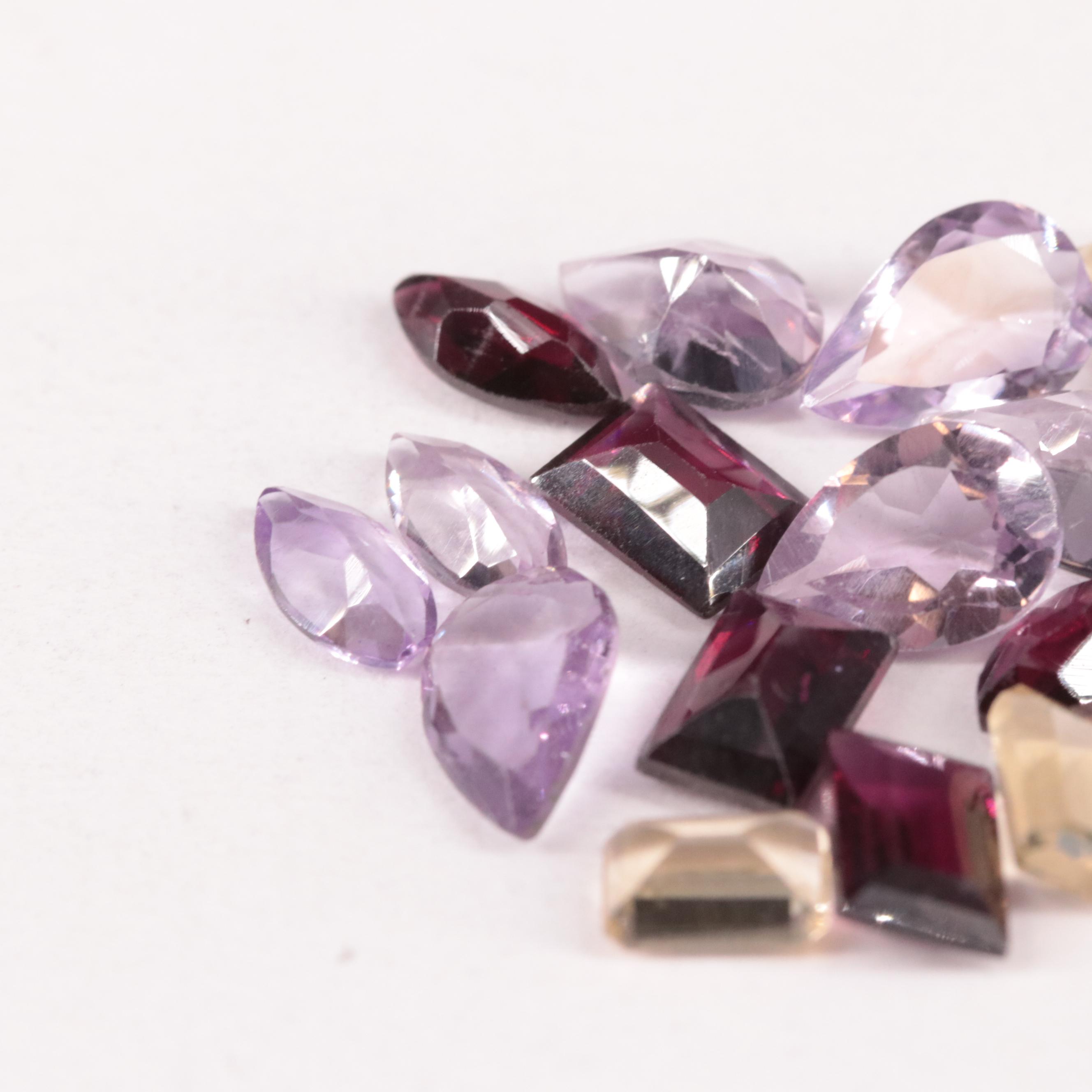Loose 12.76 CTW Amethyst, Citrine, and Rhodolite Garnet Lot