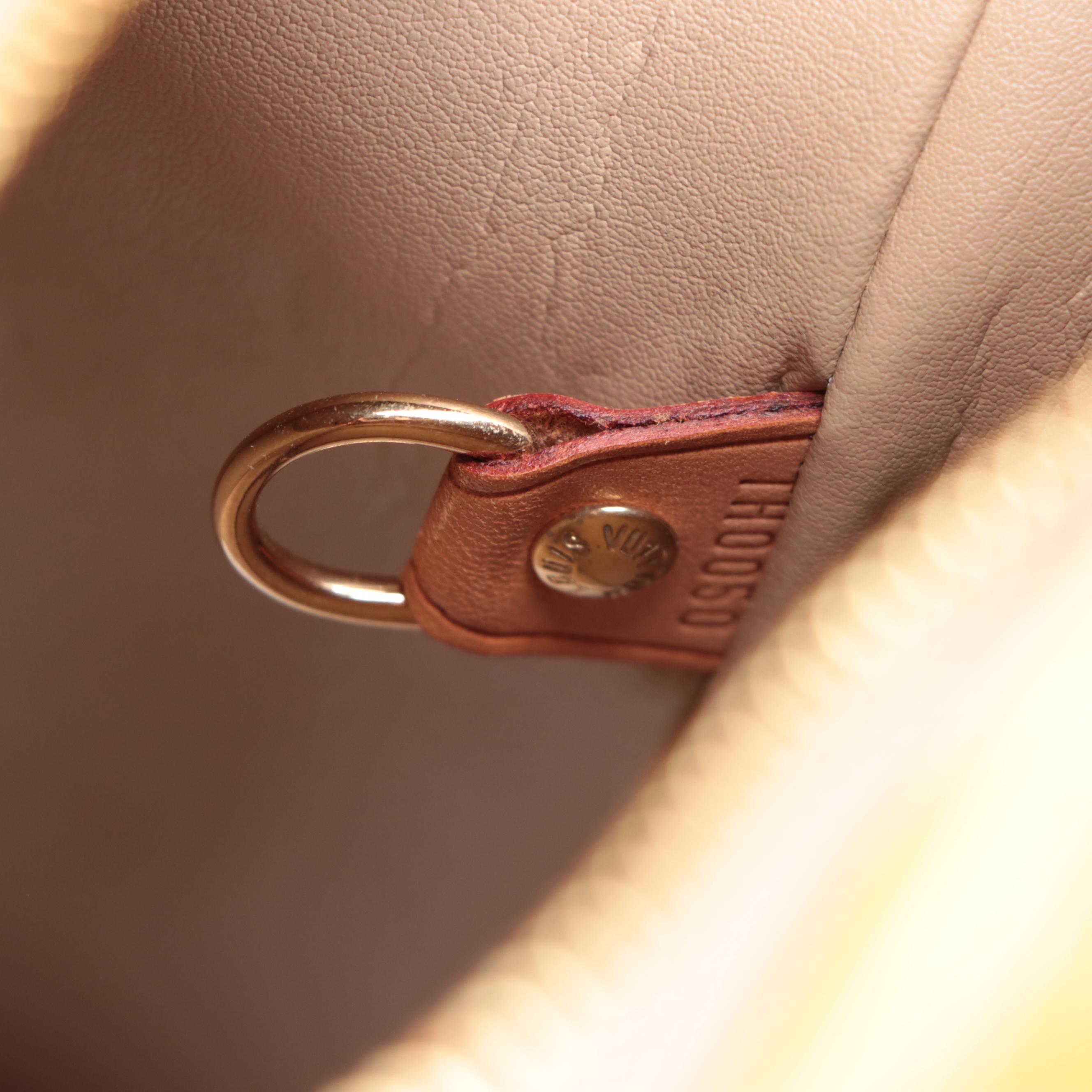Louis Vuitton Houston Bag in Monogram Vernis and Vachetta Leather