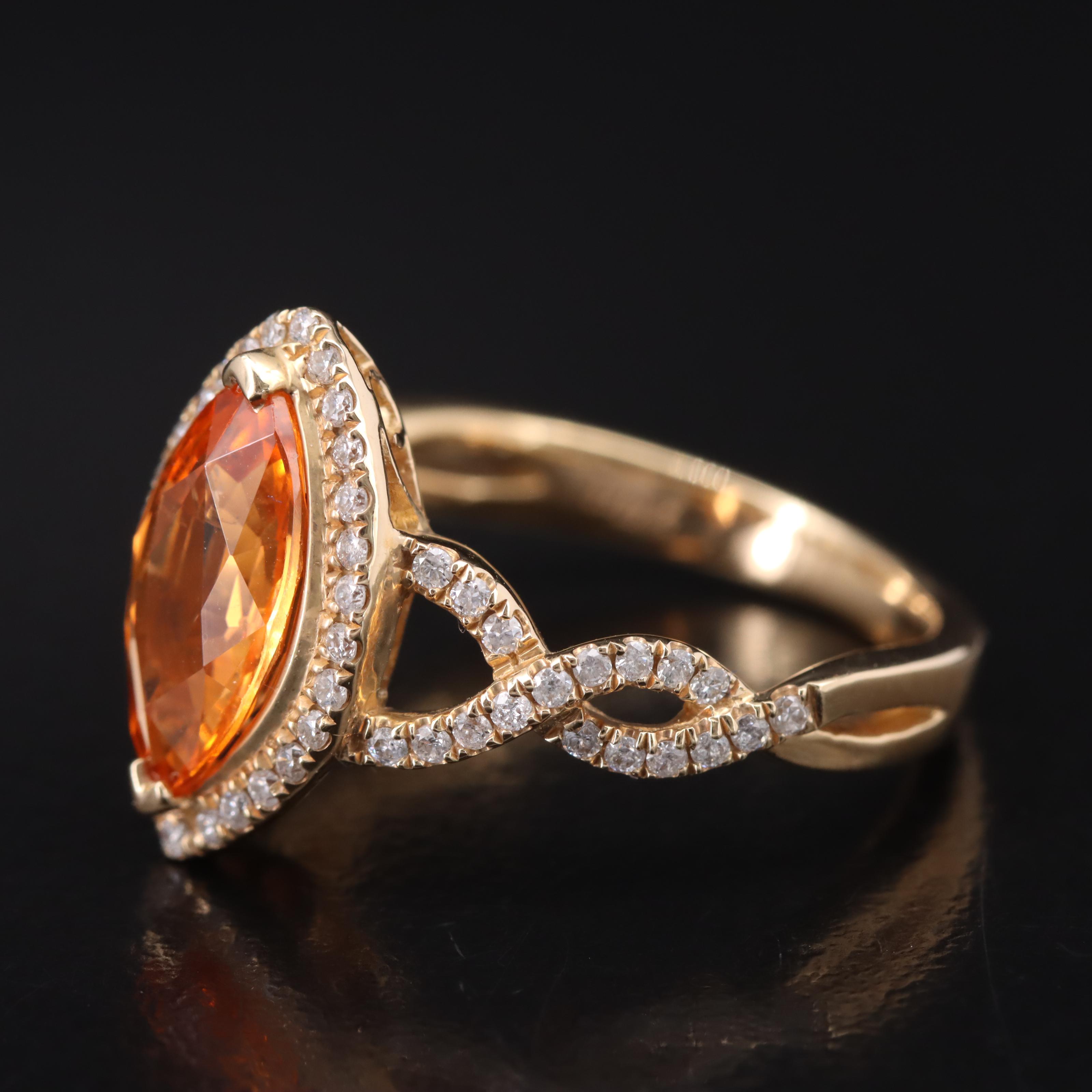 14K Spessartite Garnet and Diamond Navette Halo Ring