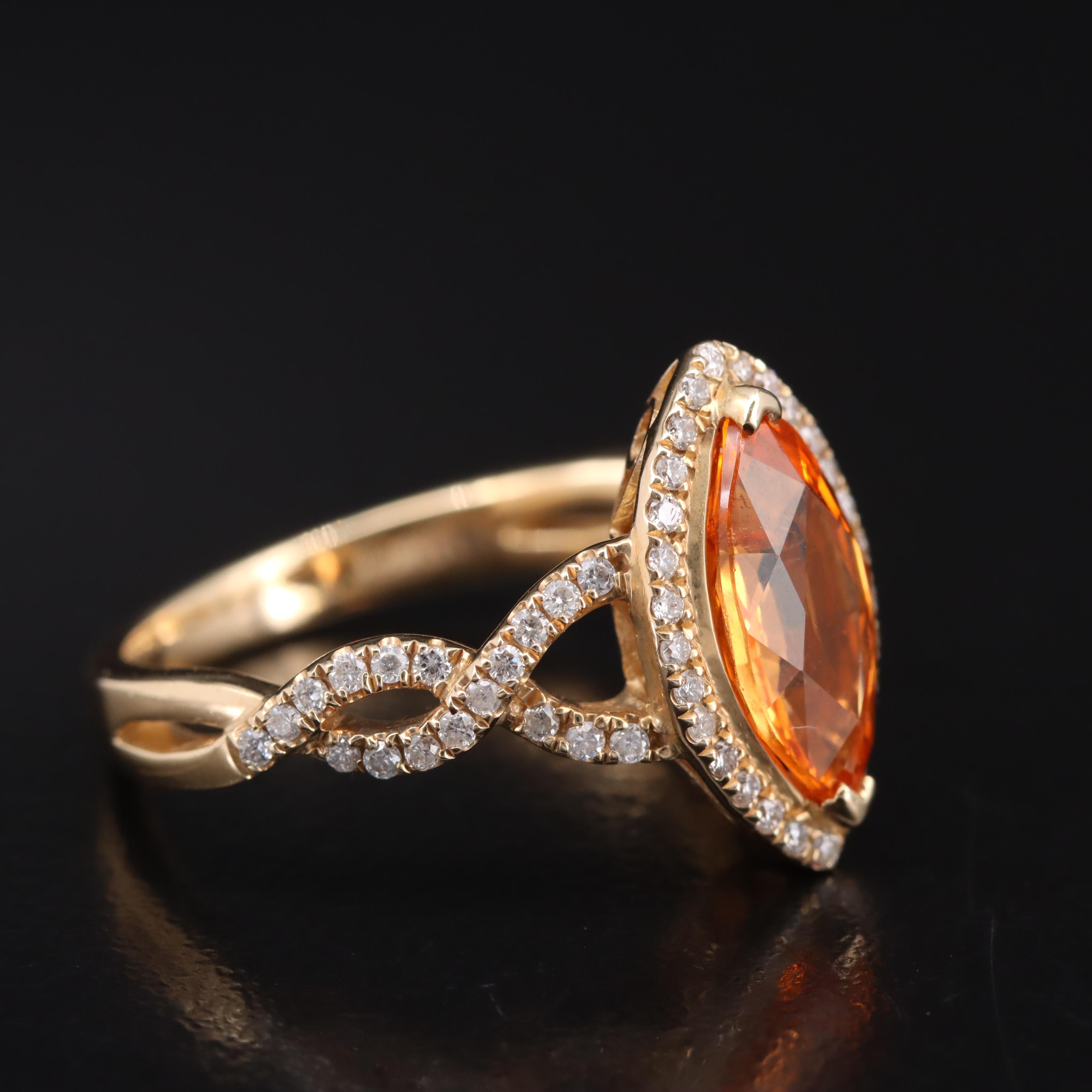 14K Spessartite Garnet and Diamond Navette Halo Ring