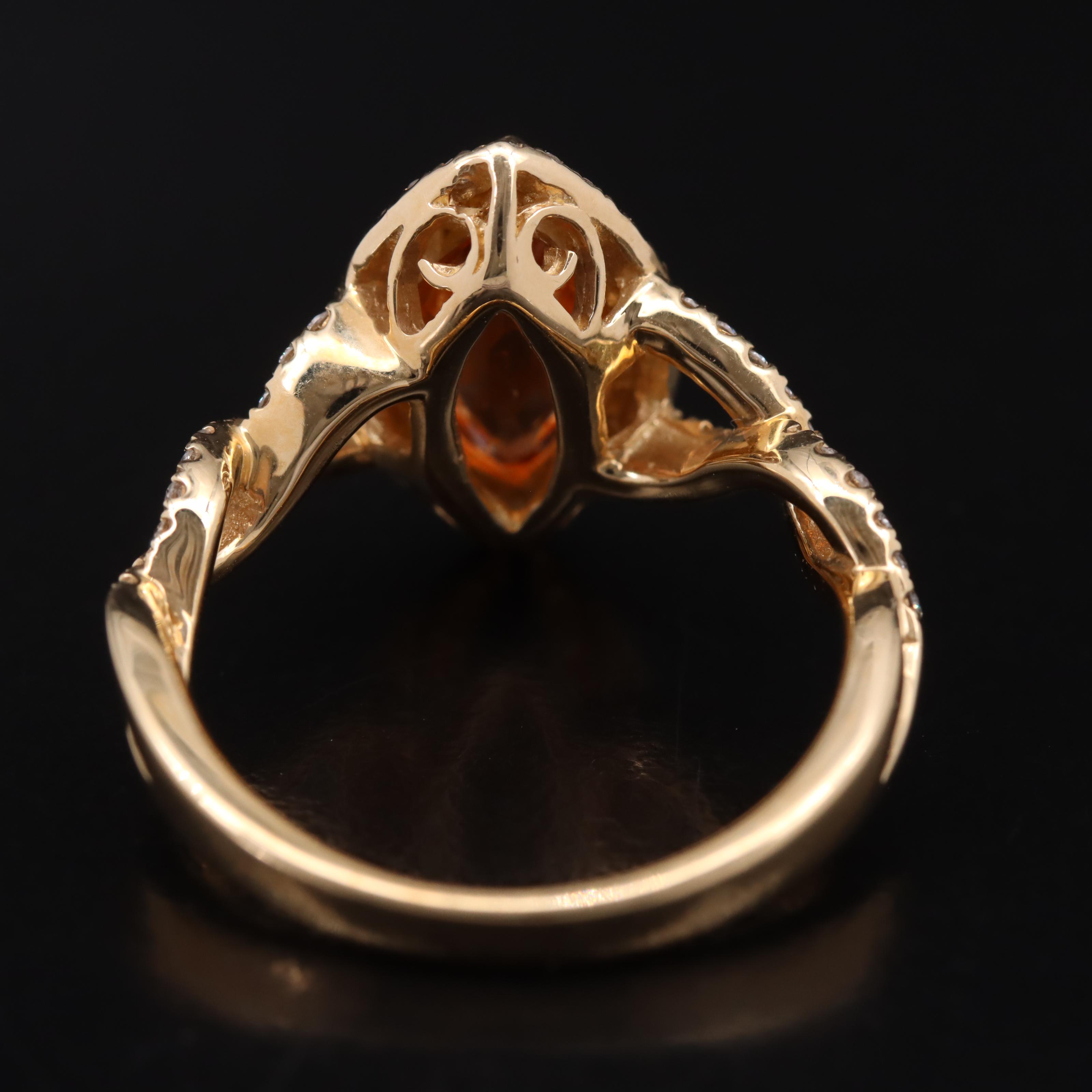 14K Spessartite Garnet and Diamond Navette Halo Ring