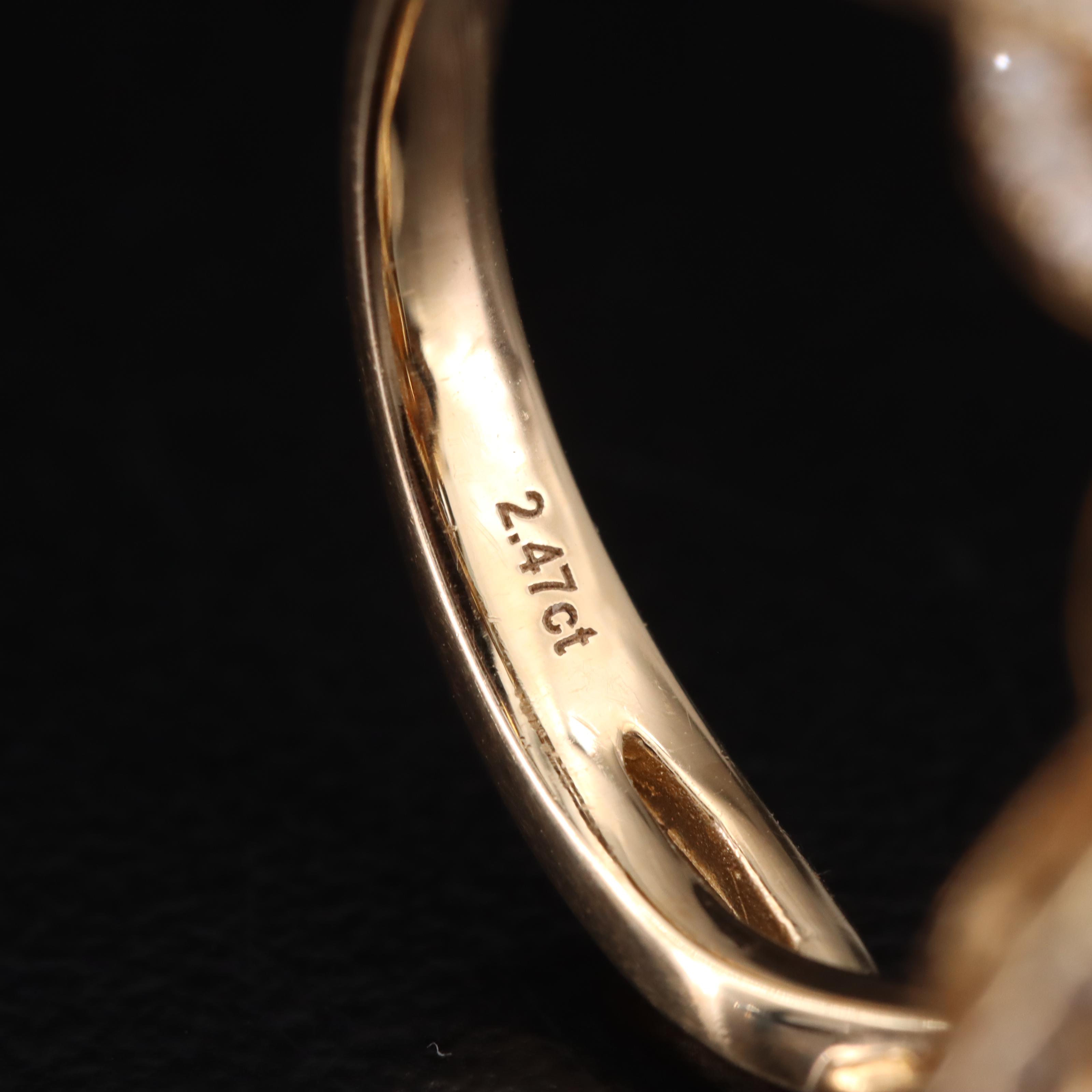 14K Spessartite Garnet and Diamond Navette Halo Ring