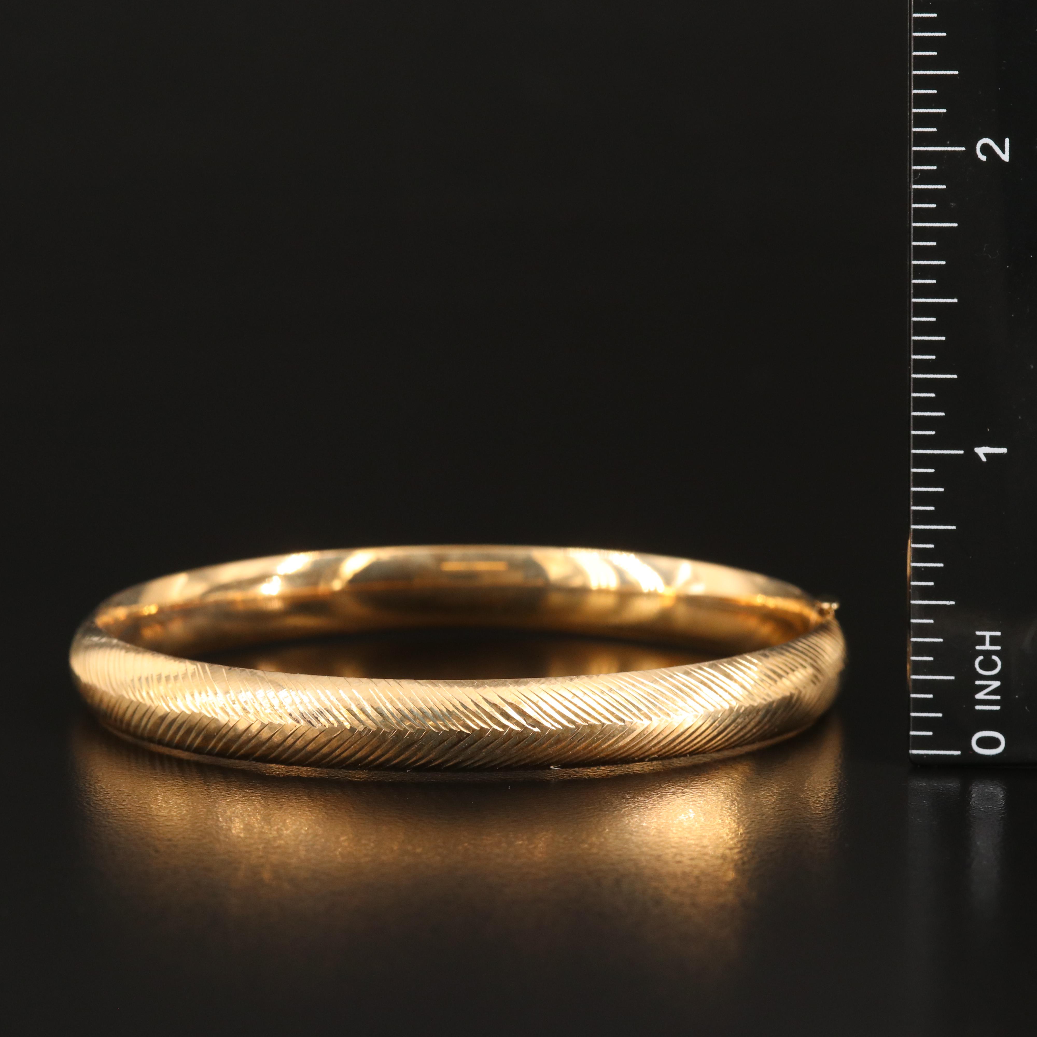 14K Hinged Bangle with Diamond Cut Herringbone Pattern
