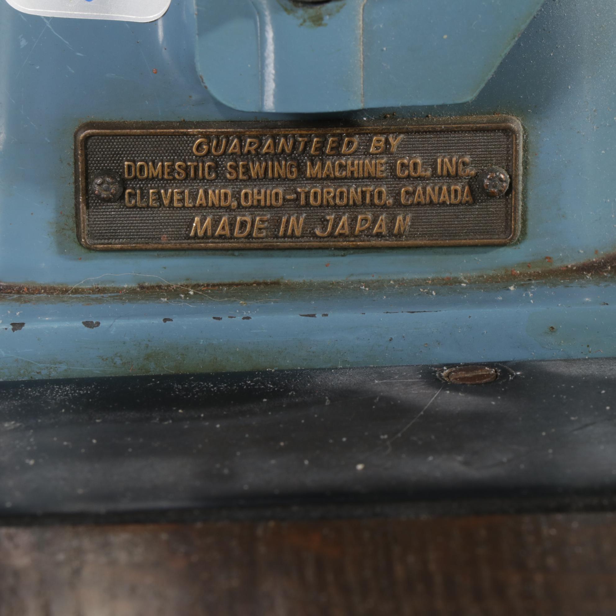 White "Domestic" Model 5135 Sewing Machine in Oak Cabinet, Mid-20th Century