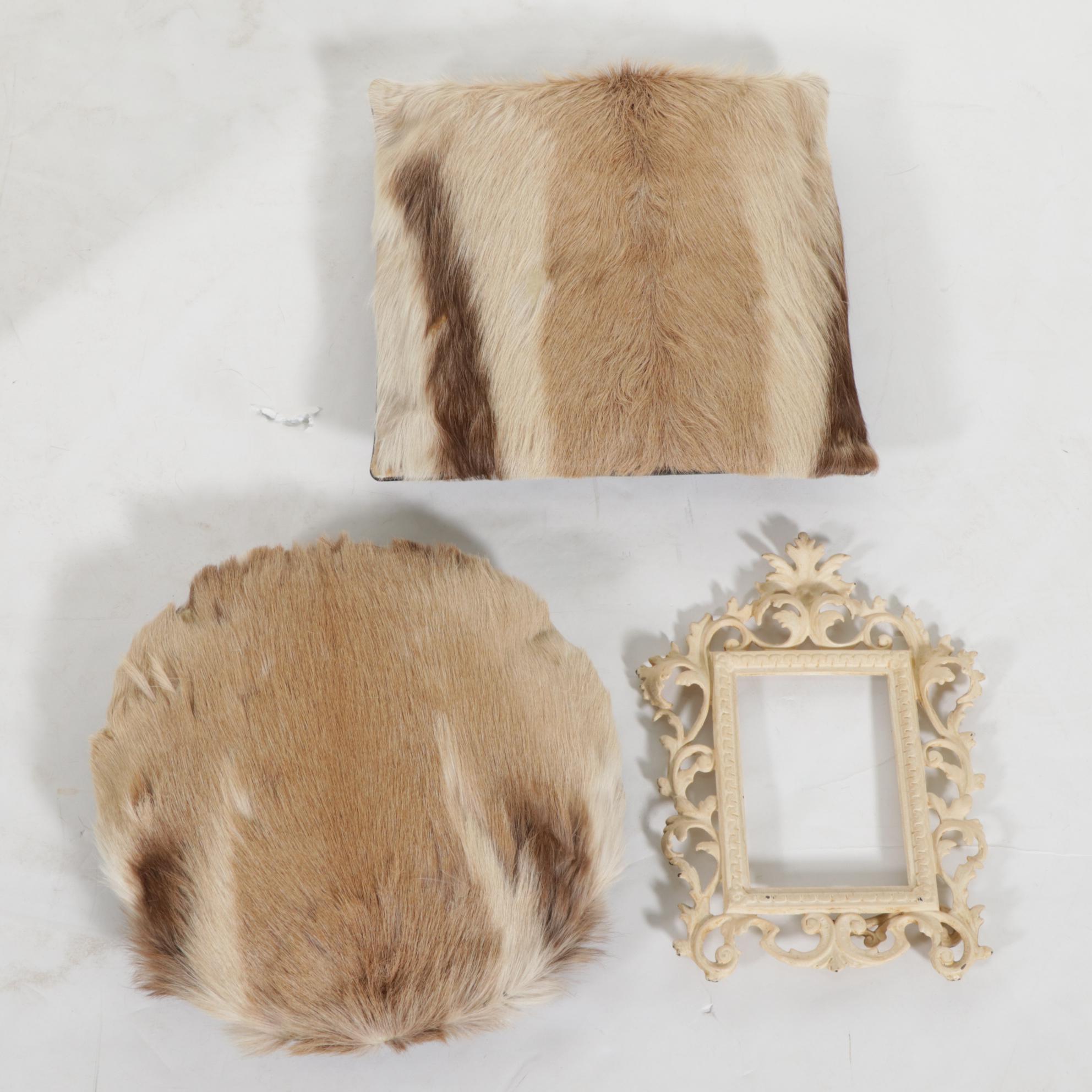 Fur and Leather Pillows, Wrought Iron Picture Frame, and Leather Trimmed Trunk